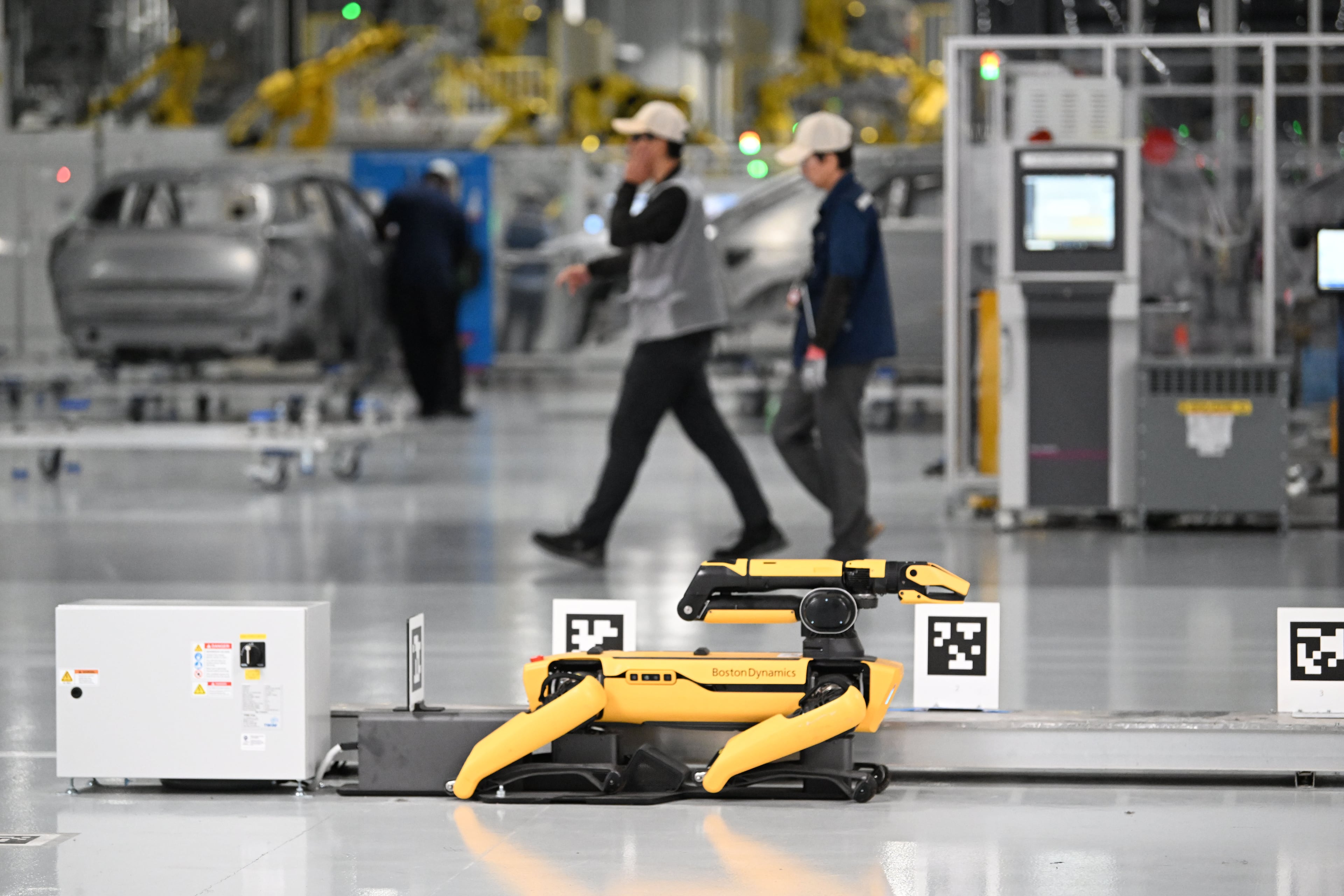 Spot from Boston Dynamics is seen at the welding line at Hyundai Motor Group Metaplant America (HMGMA) in Ellabell on Wednesday, May 6, 2026. (Hyosub Shin/AJC)