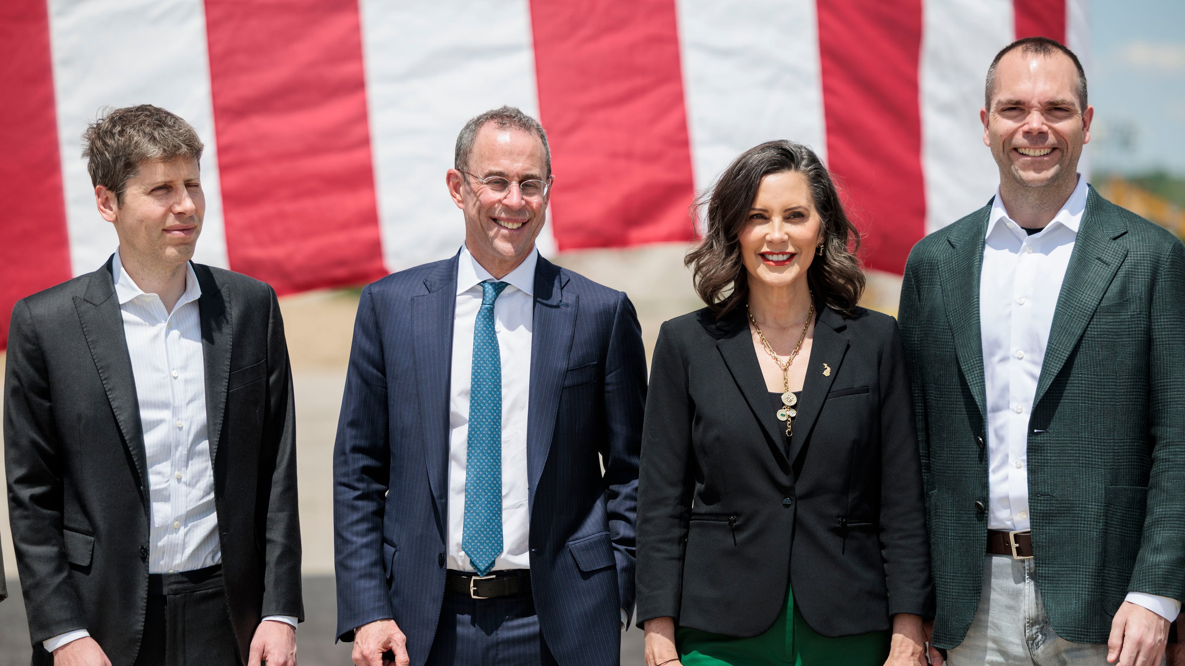 From left; OpenAI CEO Sam Altman, Related Companies CEO Brent Behrman, Gov. Gretchen Whitmer and Oracle CEO Clay Magouyrk during the groundbreaking for the Barn data center in Saline Township , Mich., on Monday, June 1, 2026. (Jacob Hamilton/Ann Arbor News via AP)