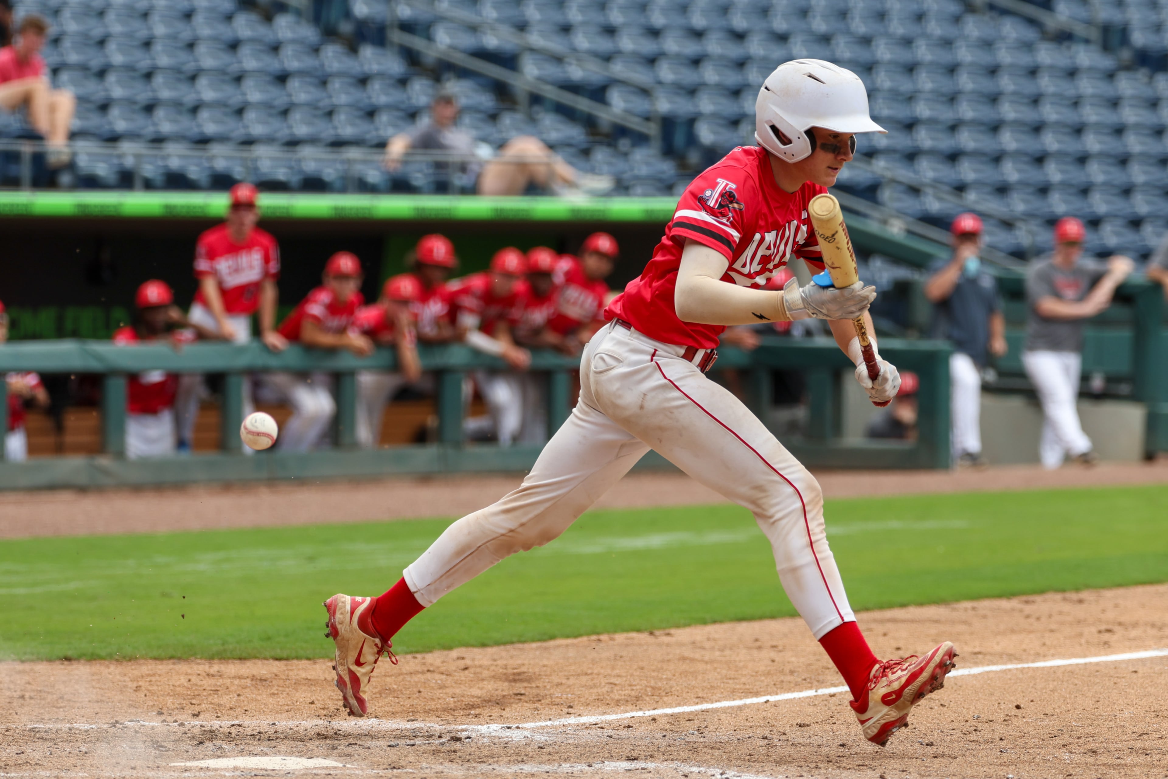 Loganville’s Dawson Allen misses a bunt during Game 2 of their GHSA Class 5A baseball championship series with Pope at Gwinnett Field on Tuesday, May 26, 2026, in Lawrenceville. (Arvin Temkar/AJC)