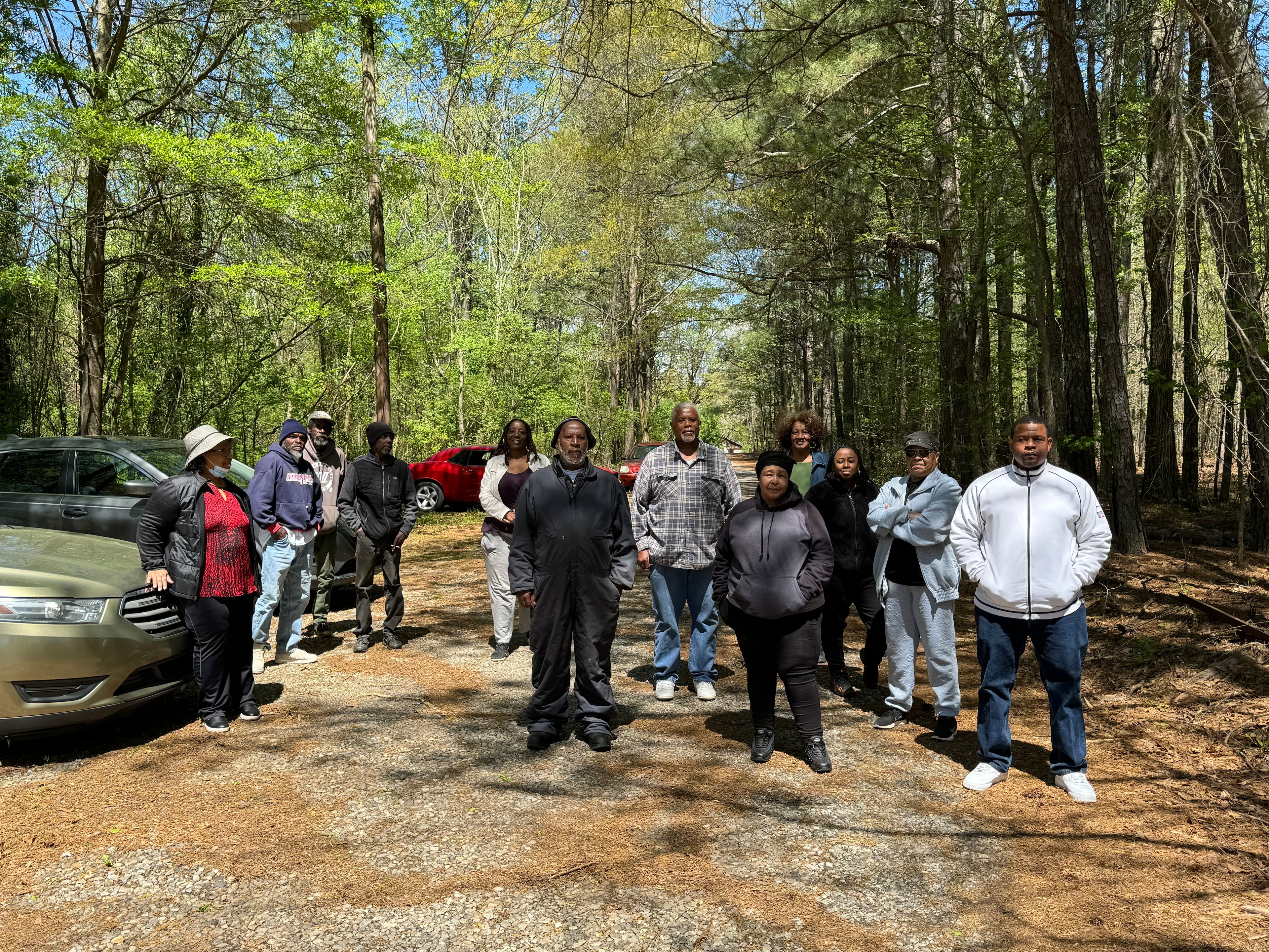 South Fulton neighbors gathered outside the home of Steven Mack. His property is steps away from NextEra's land. (Adrianne Murchison)