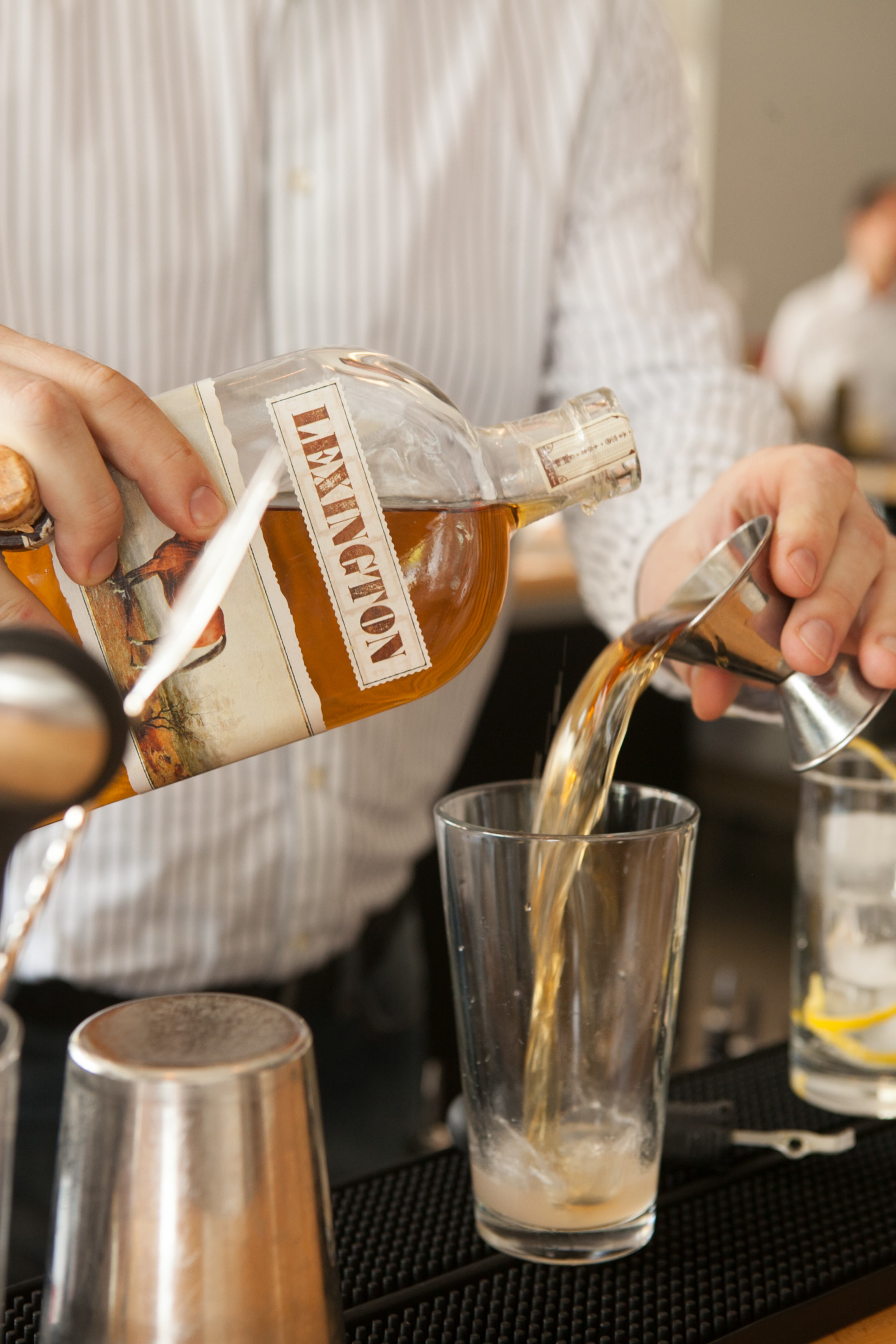 Chris McNeill, the bar manager of Seed Kitchen & Bar in Marietta, makes Horse's Neck (With a Kick) using bourbon. (styling by Chris McNeill ) (photo by Renee Brock / special)