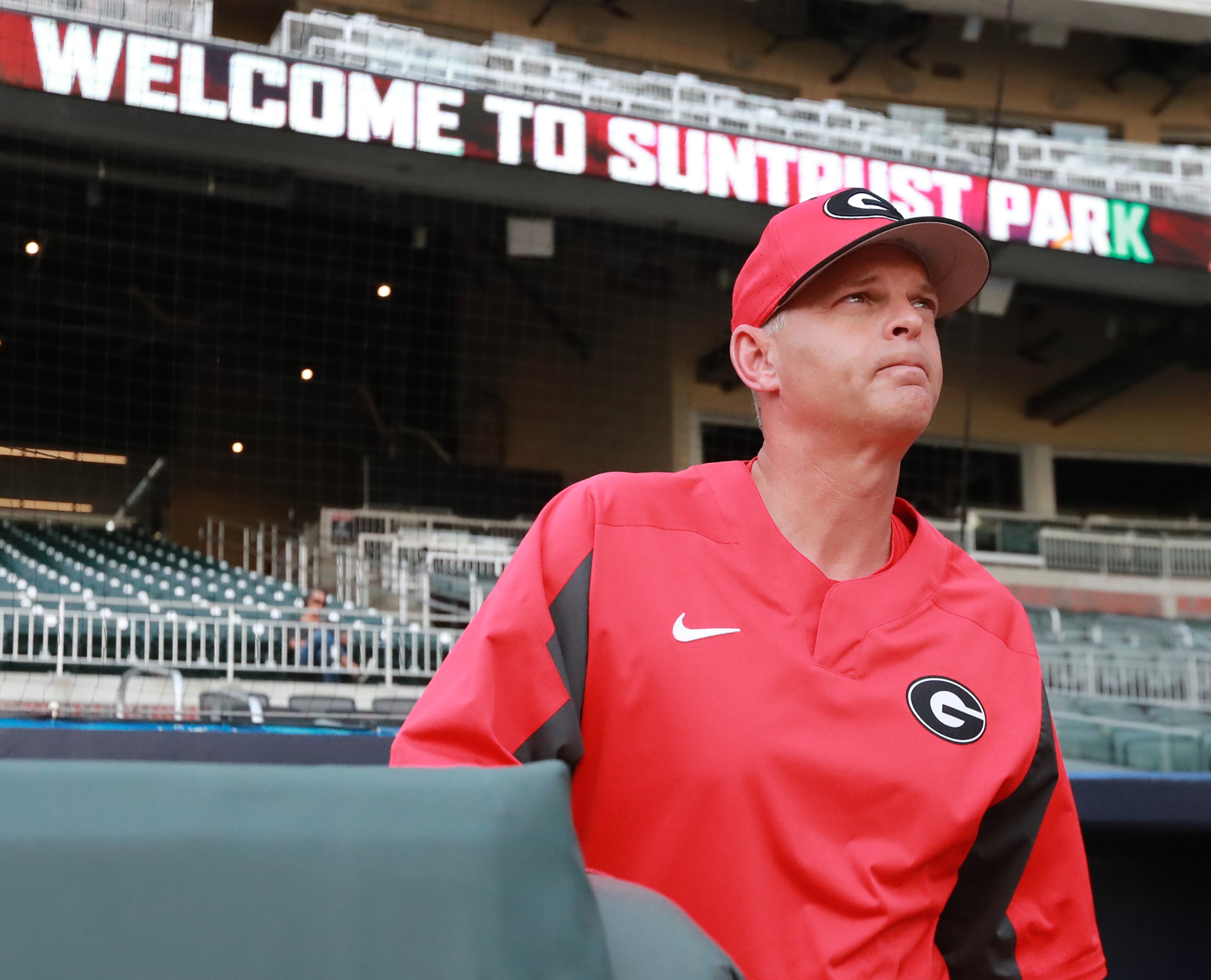 April 23, 2019 Atlanta: Georgia head baseball coach Scott Stricklin takes the field as he prepares his team to play Georgia Tech in the Spring Classic NCAA college baseball game at SunTrust Park on Tuesday, April 23, 2019, in Atlanta. Curtis Compton/ccompton@ajc.com