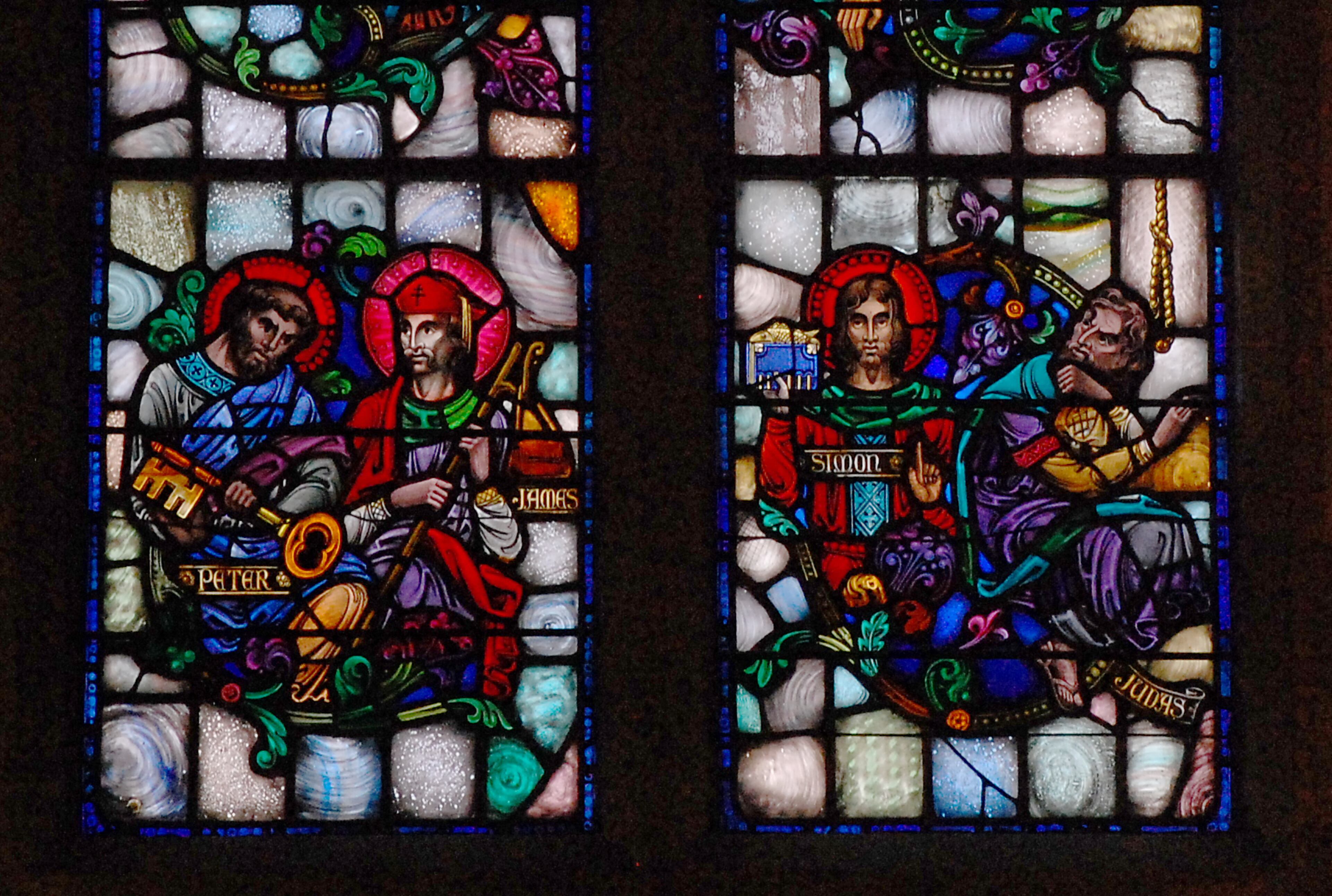 The next window shows the twelve apostles, each one carrying a symbol according to traditions associated with them. For instance, Peter on the left carries the key to the Kingdom. On the right, Judas turns away from the group while holding a bag of money. A noose ominously descends in front of him. (PETE CORSON / PCORSON@AJC.COM)