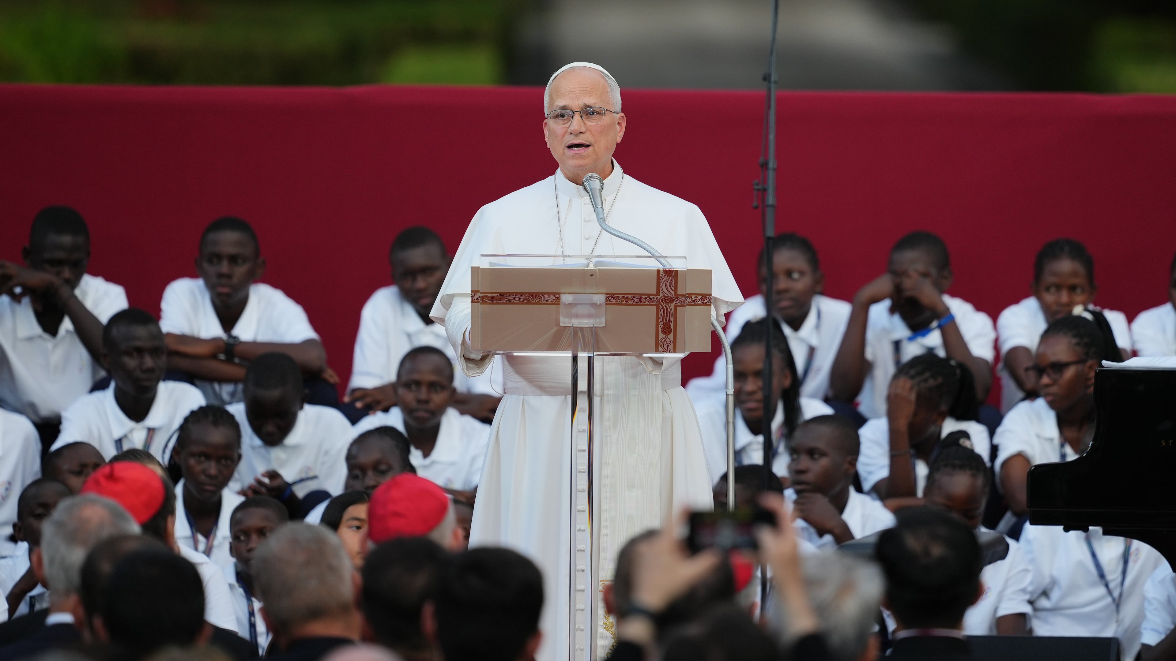 Pope Leo XIV speaks as he attends the "Canticle of Peace" prayer and fraternity meeting at Borgo Laudato Si' in Castel Gandolfo, about 30 kilometers (19 miles) southwest of Rome, Italy, Wednesday, July 29, 2026. (AP Photo/Alessandra Tarantino)