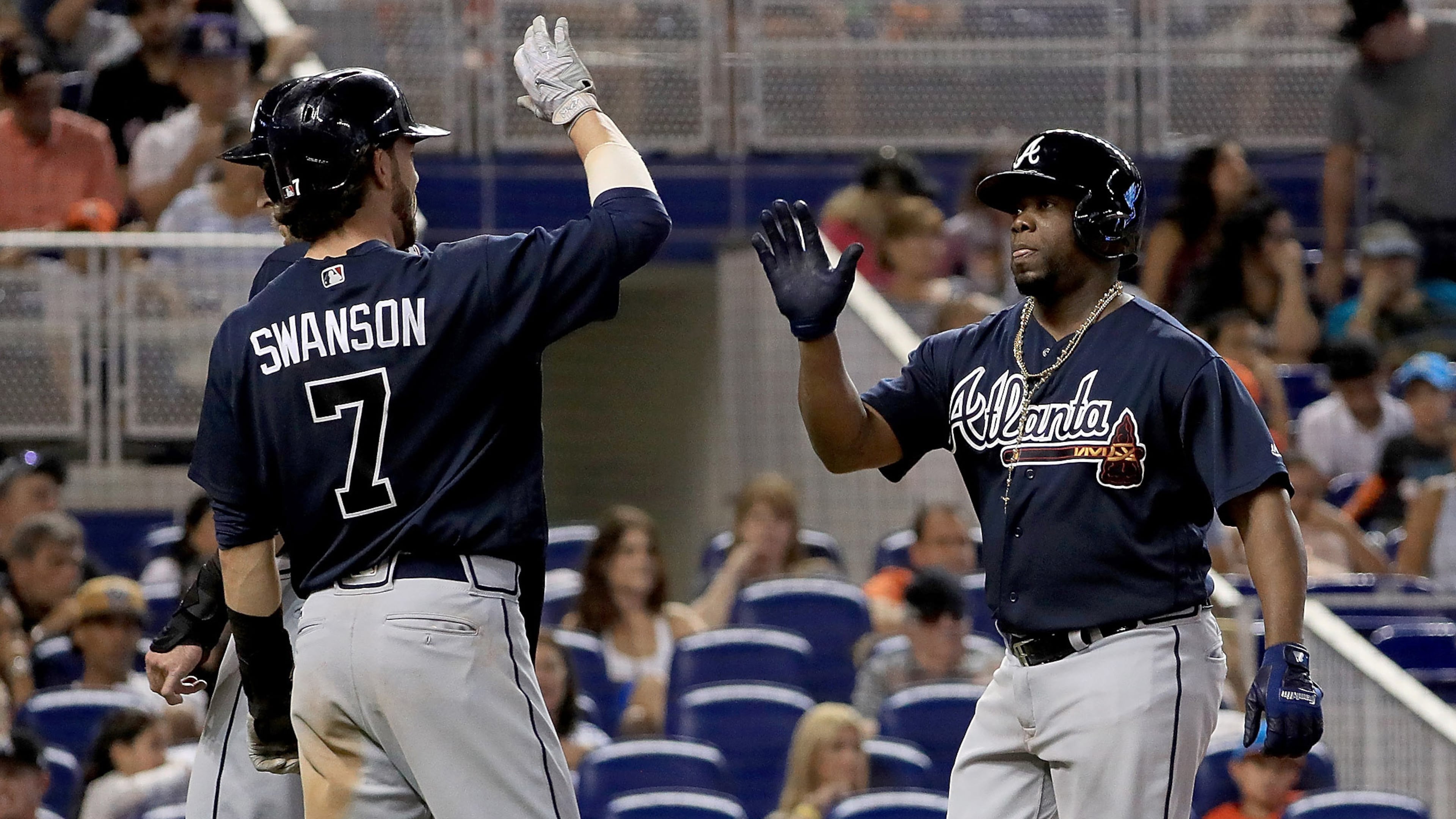 MIAMI, FL - OCTOBER 01: Adonis Garcia #13 of the Atlanta Braves is congratulated after hitting a three run home run in the seventh inning during a game against the Miami Marlins at Marlins Park on October 1, 2017 in Miami, Florida. (Photo by Mike Ehrmann/Getty Images)