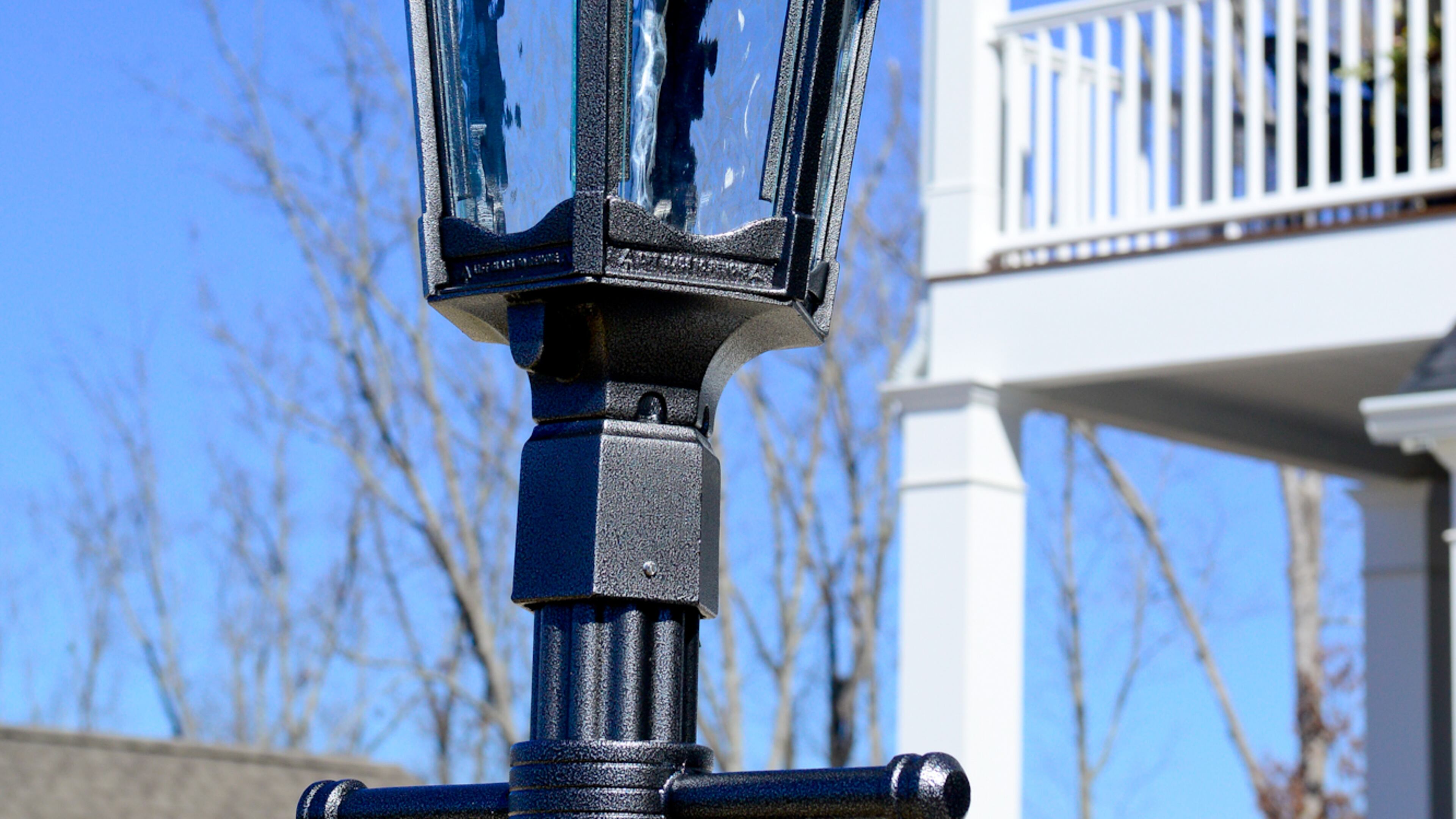 The couple added a LED light from American Gas Lamp Works to give the effect of a lamplit Charleston street on their driveway.