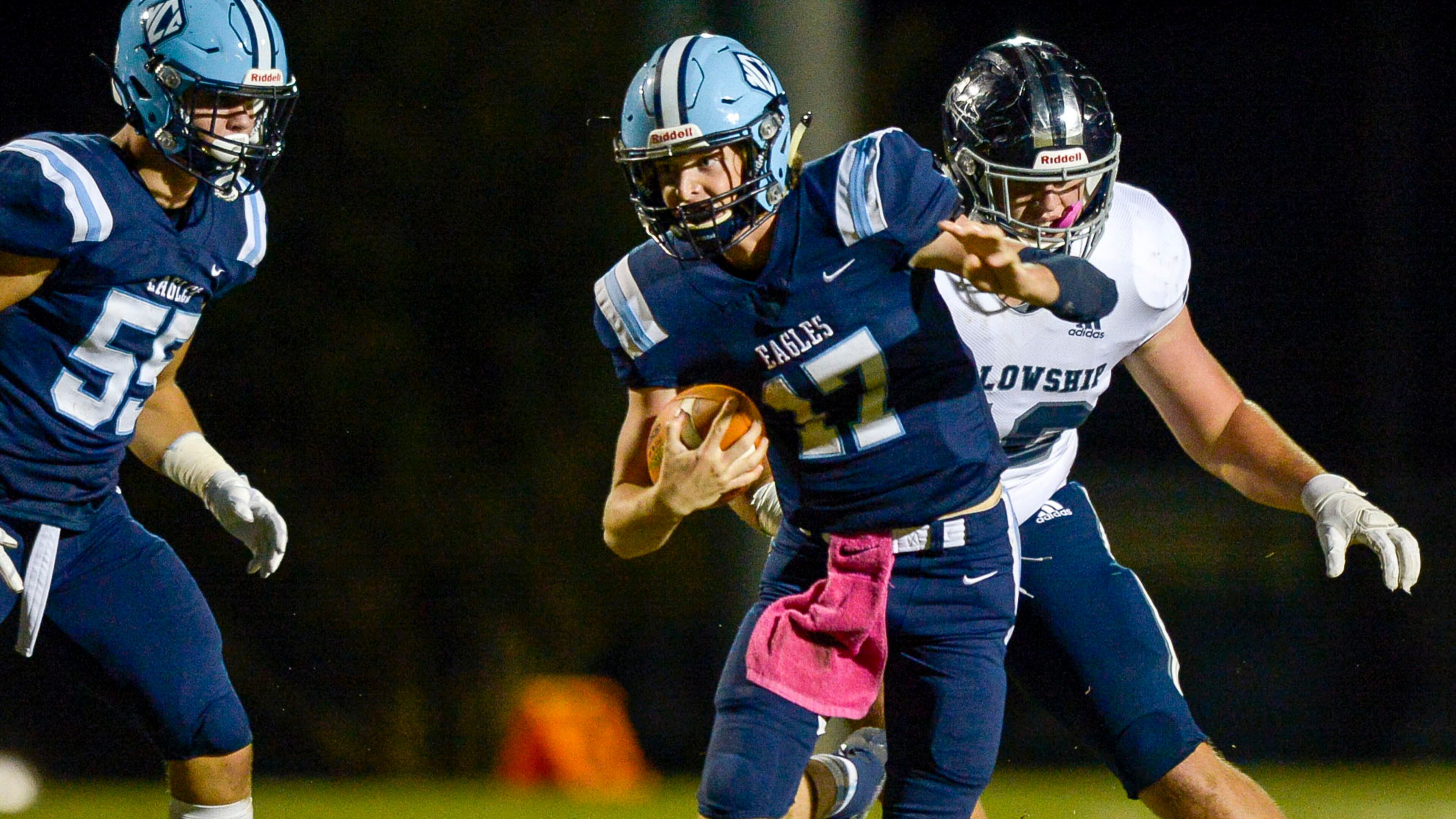 Luke Brock of North Cobb carries the ball for yardage in the first half of his game against Fellowship Christian Friday.