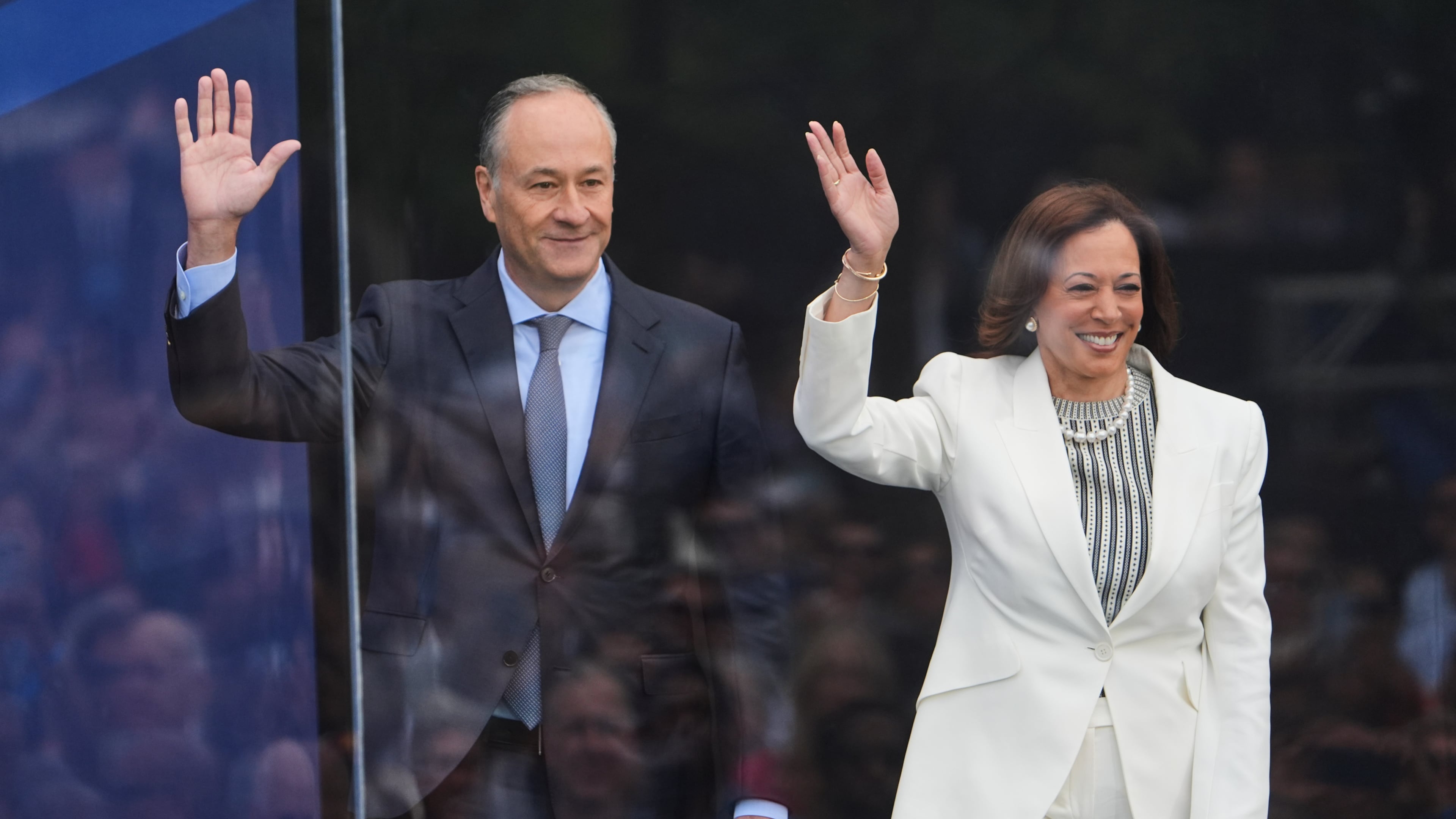 FILE - Former Vice President Kamala Harris and her husband Doug Emhoff arrive on stage during the dedication ceremony for the Obama Presidential Center, on June 18, 2026, in Chicago. (AP Photo/Jeff Roberson, File)