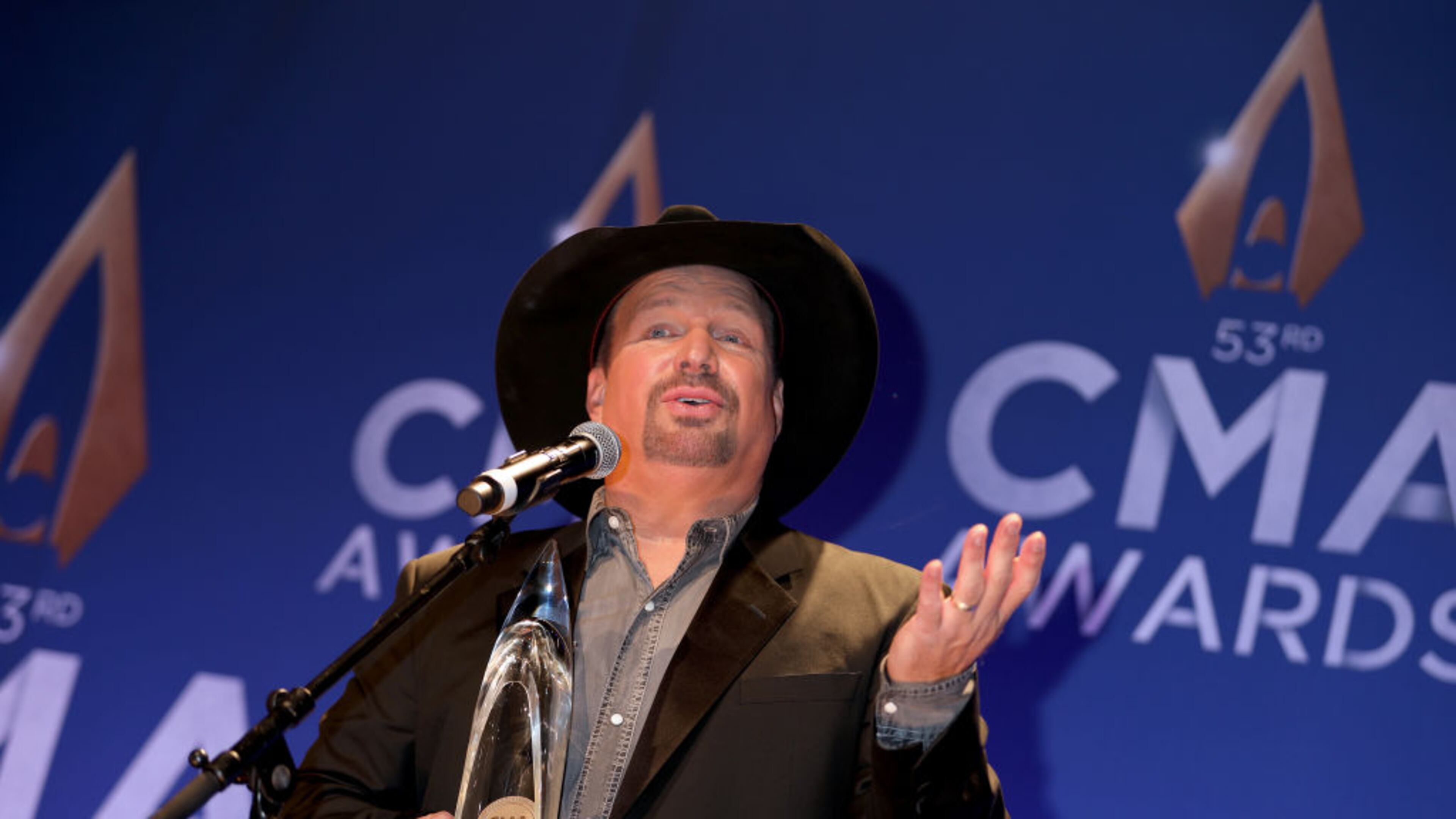 Garth Brooks poses with the CMA Award for Entertainer of the Year at the press room of the 53rd annual CMA Awards at the Bridgestone Arena on November 13, 2019 in Nashville, Tennessee. (Photo by Leah Puttkammer/Getty Images)