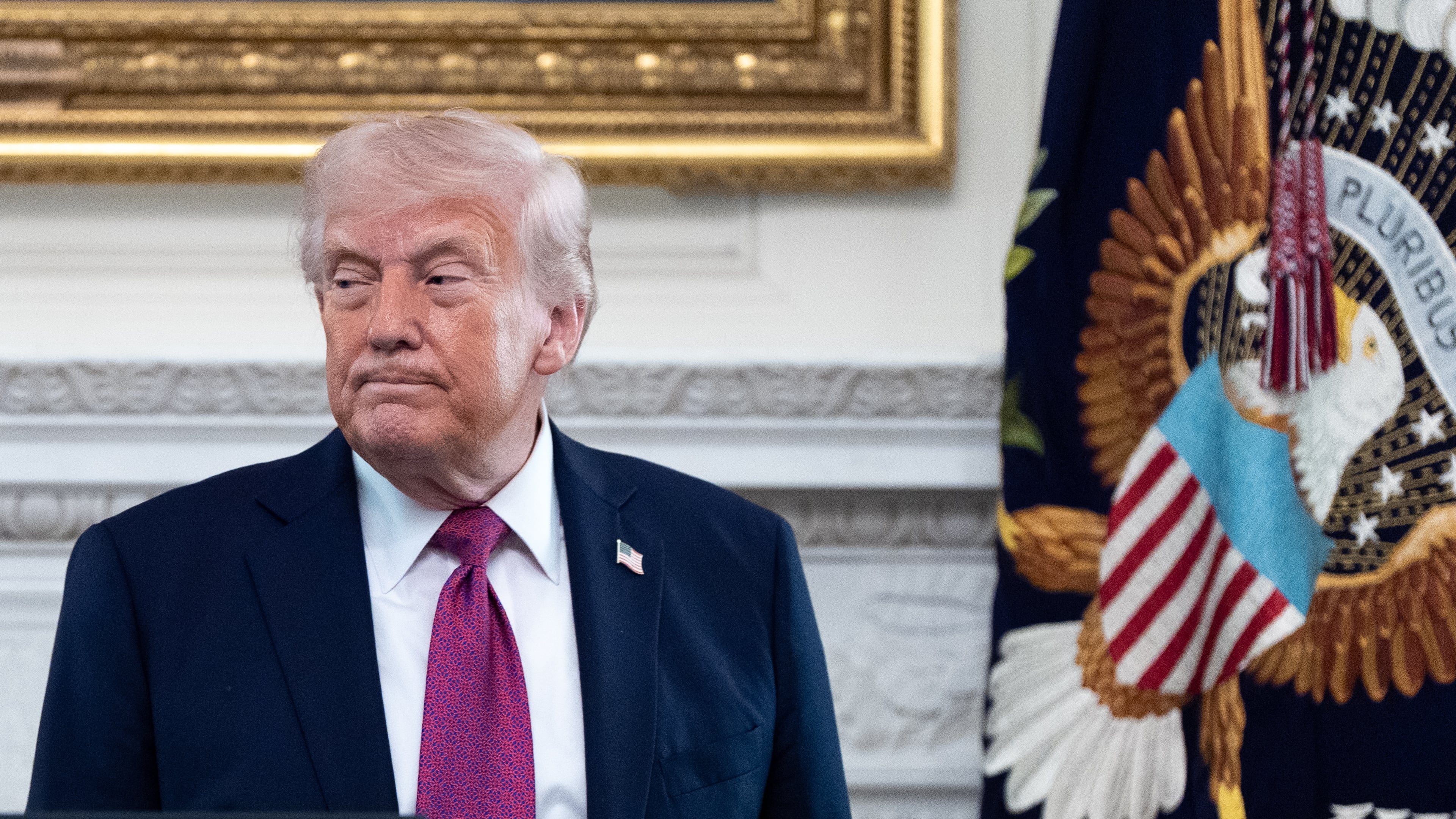 President Donald Trump departs after speaking at an event for NCAA national champions in the State Dining Room of the White House, Tuesday, April 21, 2026, in Washington. (AP Photo/Alex Brandon)