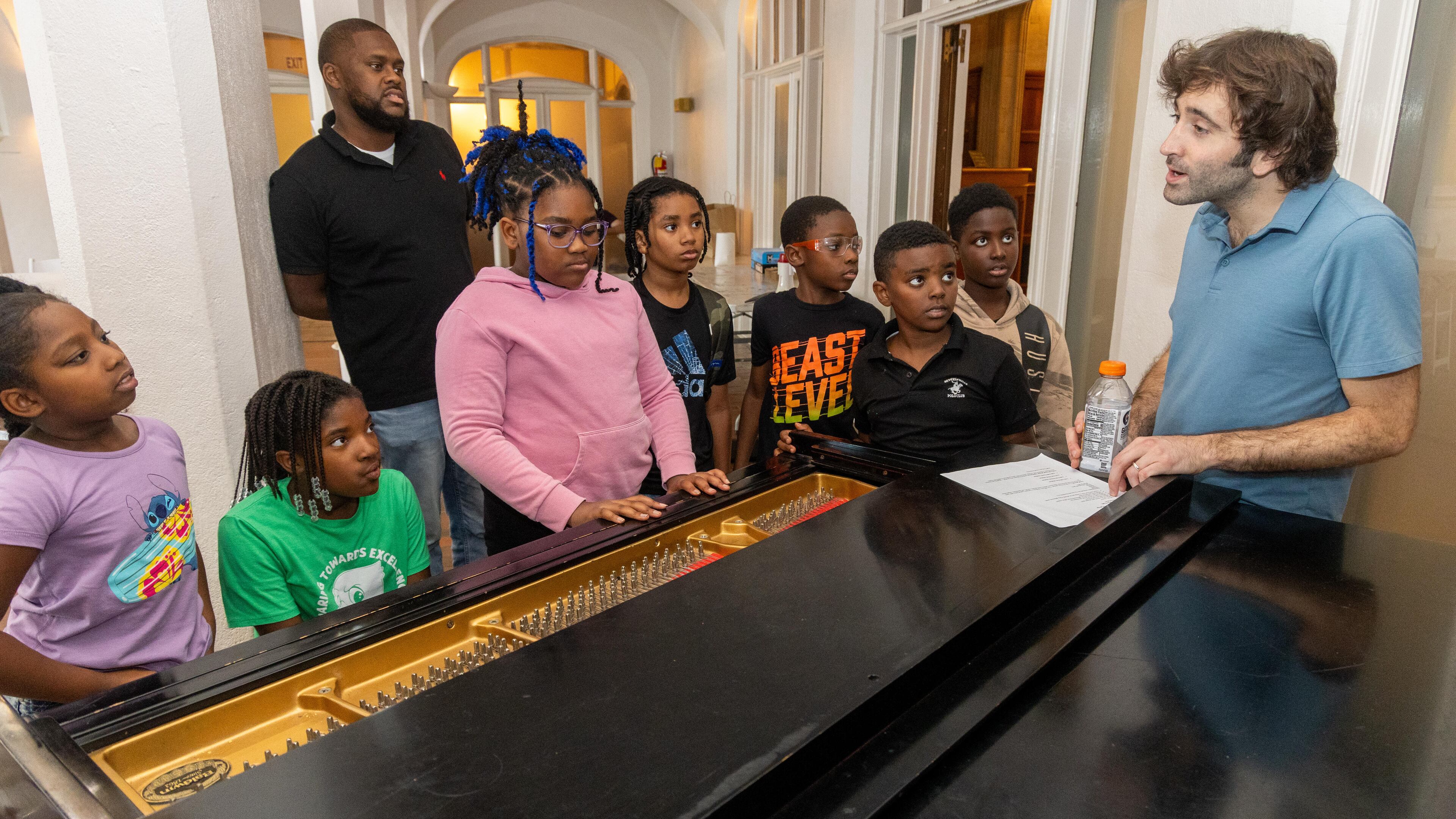 Jazz musician Joe Alterman (far right) answers questions about the piano at a summer camp at Callanwolde Fine Arts Center. PHIL SKINNER FOR THE ATLANTA JOURNAL-CONSTITUTION