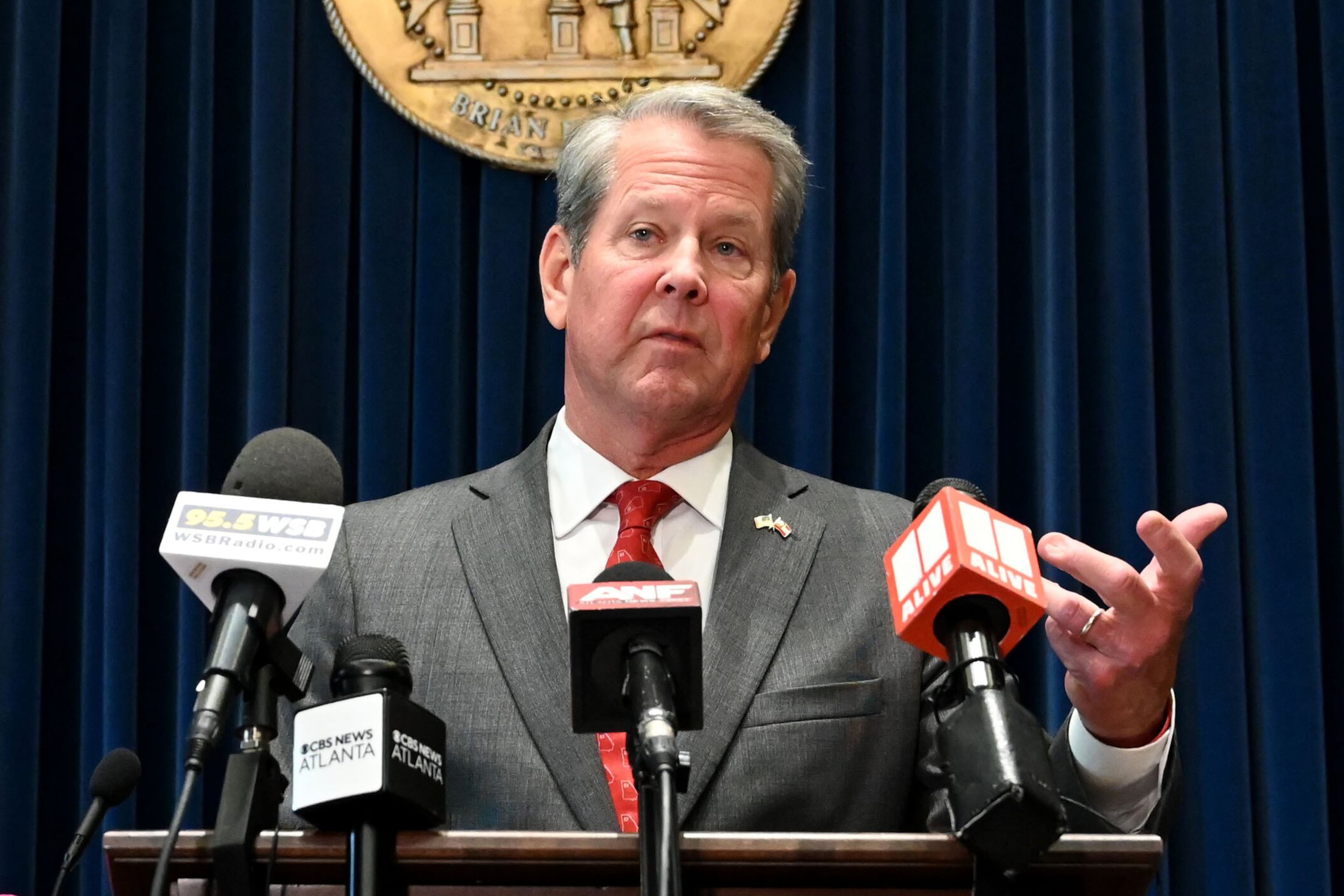 Gov. Brian Kemp speaks before signing the state’s new budget at the Georgia State Capitol on Tuesday, May 12, 2026, in Atlanta. Gov. Brian Kemp on Tuesday signed the state’s new budget – but not without deleting about $300 million of spending approved by the General Assembly just last month. (Hyosub Shin/AJC)