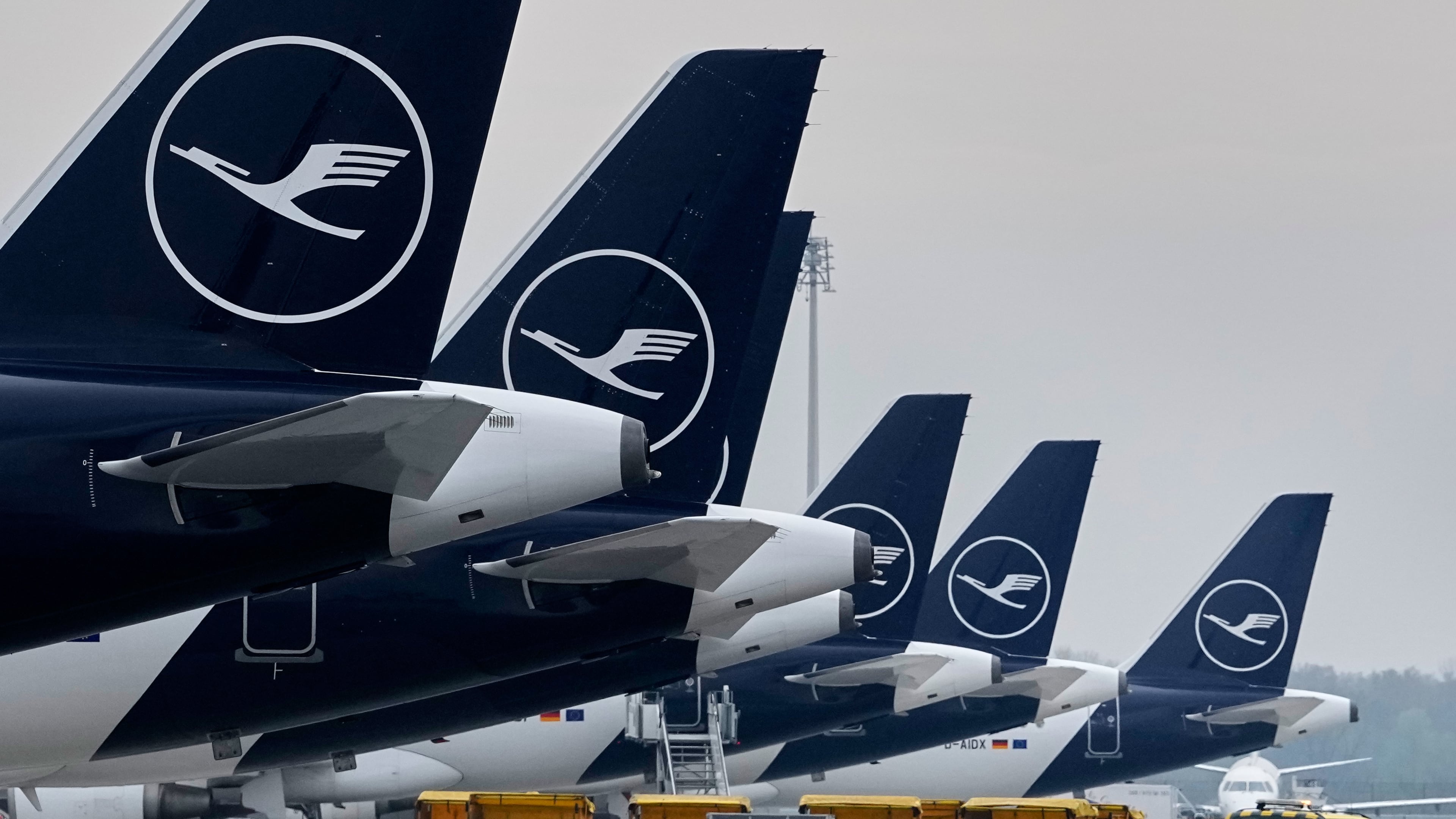 FILE - Lufthansa aircraft are parked at an airpor in Munich, Germany, April 13, 2026. (AP Photo/Matthias Schrader, File)