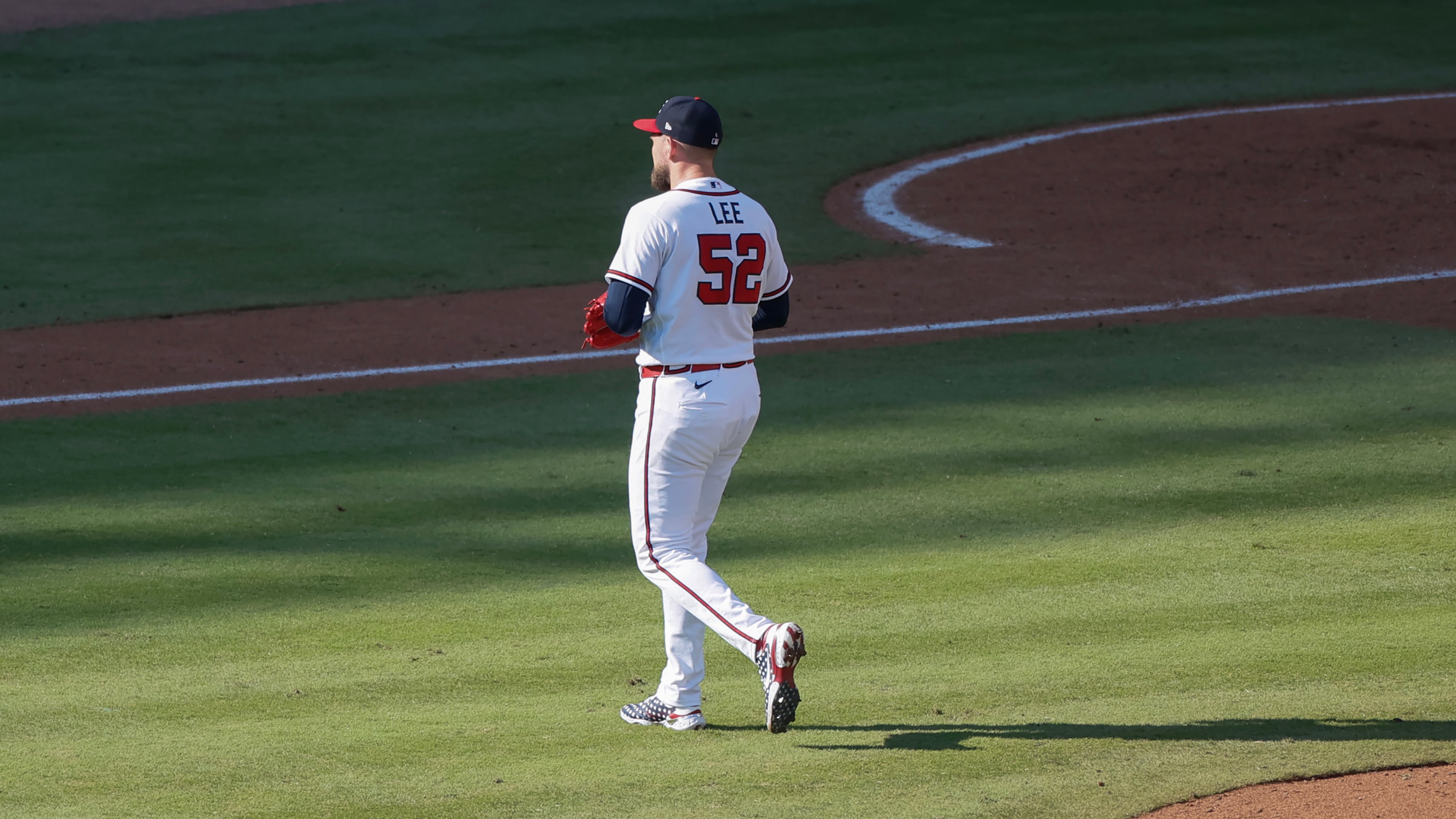 Atlanta Braves pitcher Dylan Lee walks off the mound after being relieved against the Philadelphia Phillies during the eighth inning of Game 2 of a MLB National League Wild Card playoff series between the Braves and the Phillies, Wednesday, Sept. 30, 2026, in Atlanta. (Miguel Martinez/AJC)