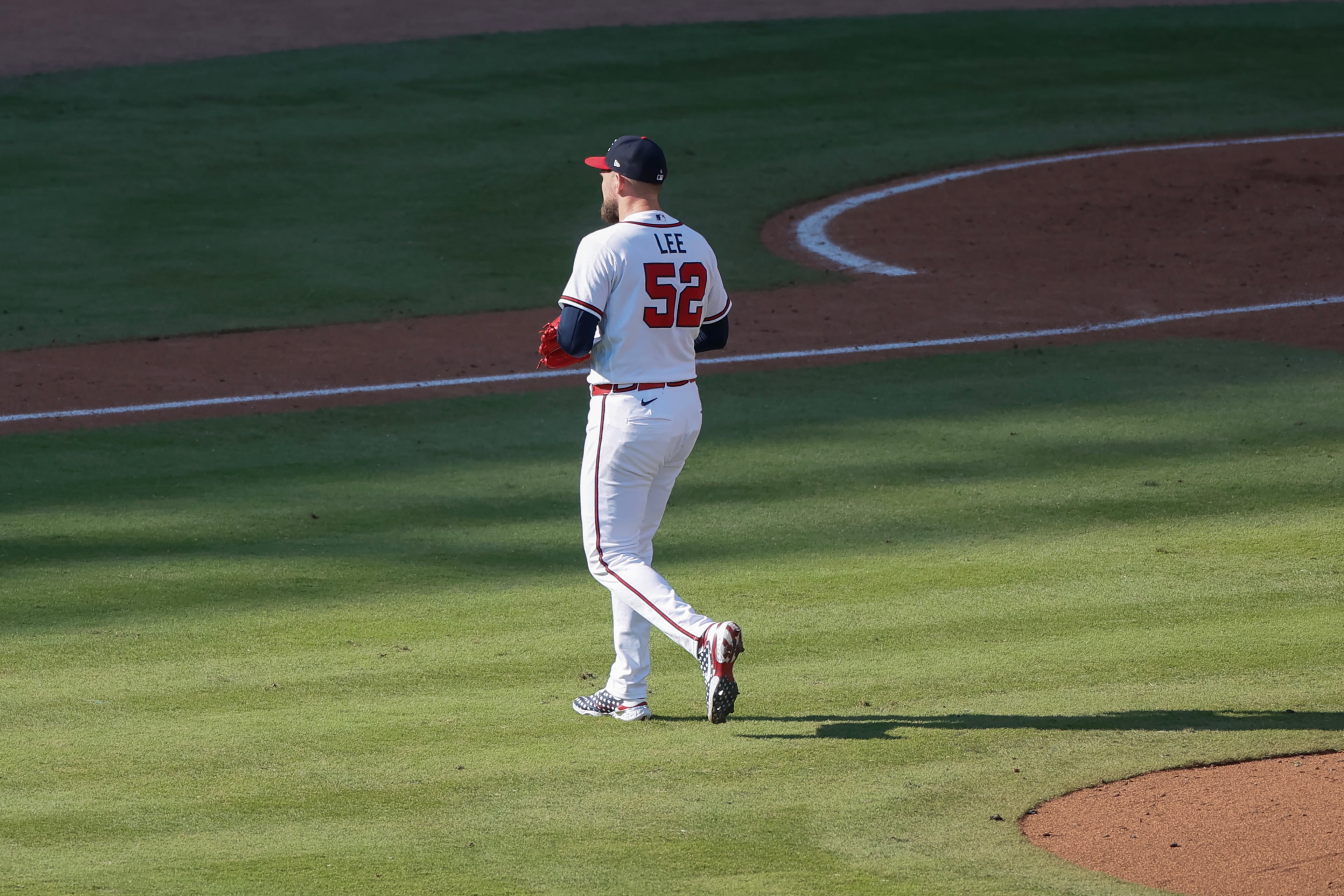Atlanta Braves pitcher Dylan Lee walks off the mound after being relieved against the Philadelphia Phillies during the eighth inning of Game 2 of a MLB National League Wild Card playoff series between the Braves and the Phillies, Wednesday, Sept. 30, 2026, in Atlanta. (Miguel Martinez/AJC)