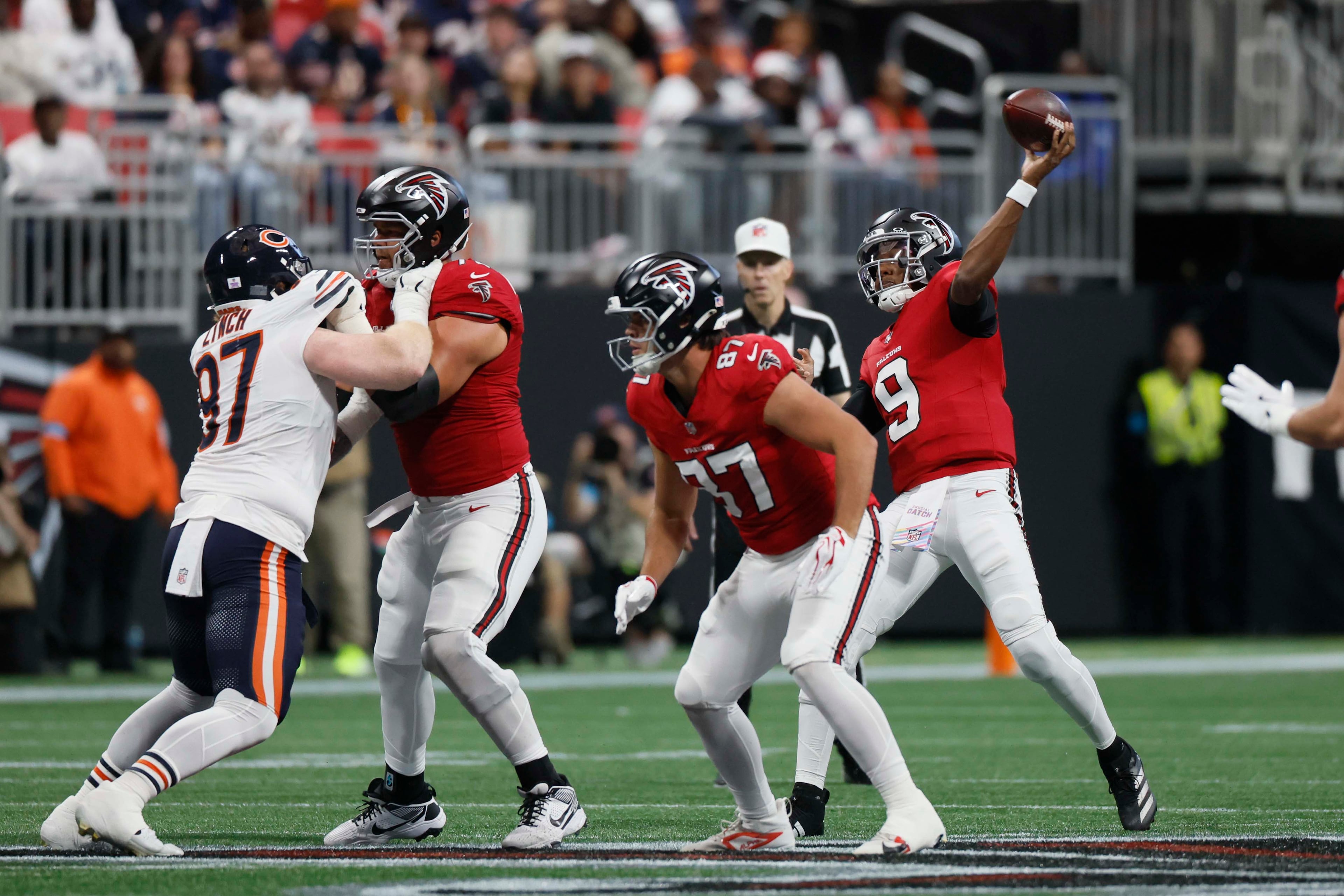 Atlanta Falcons quarterback Michael Penix Jr. throws for a touchdown during the second half of an NFL football game against the Chicago Bears at Mercedes-Benz Stadium in Atlanta on Sunday, Oct. 18, 2026. (Miguel Martinez/AJC)