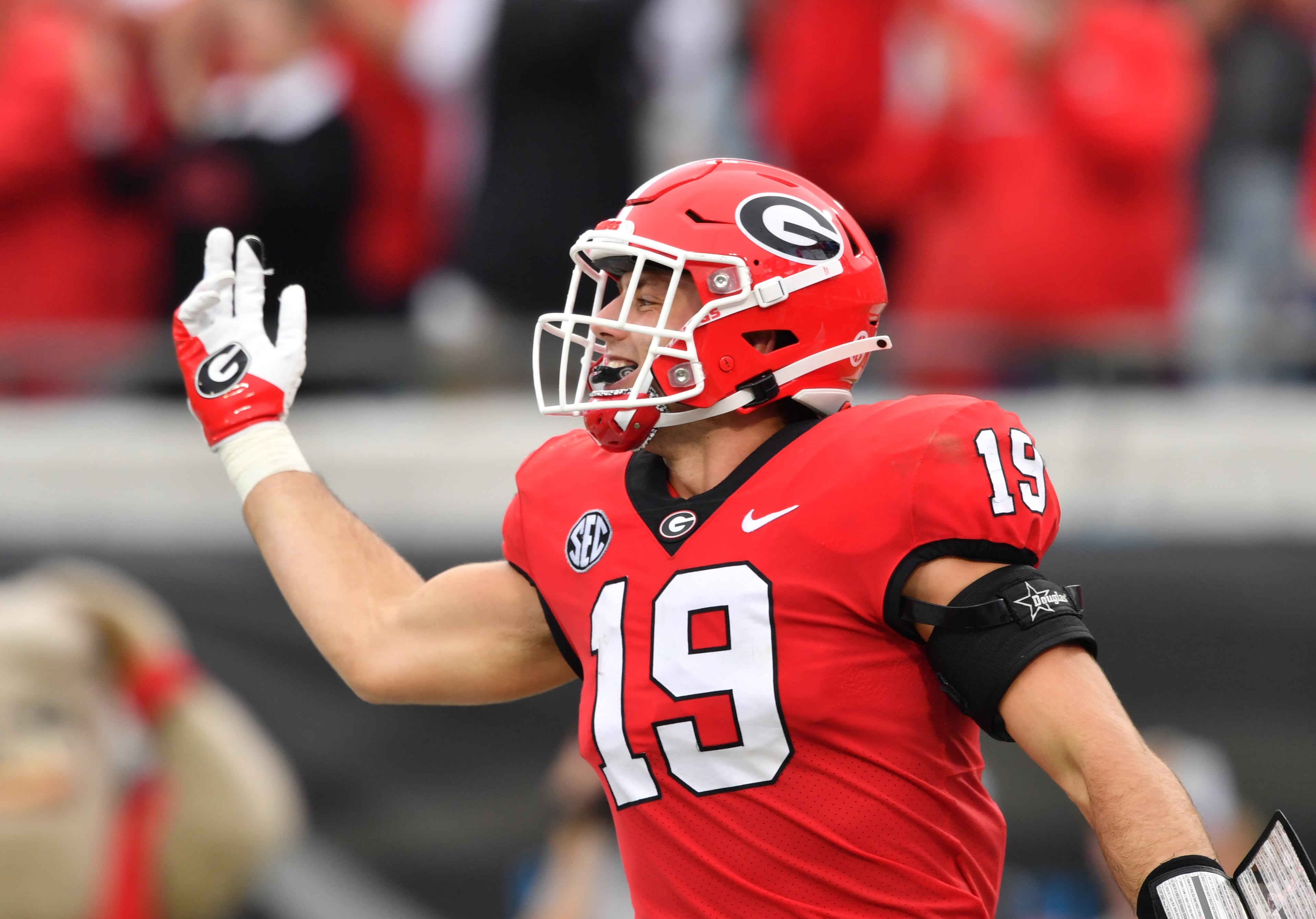 Georgia's tight end Brock Bowers (19) celebrates after scoring a touchdown during the first half in an NCAA college football game at TIAA Bank Field in Jacksonville, Florida on Saturday, October 29, 2022. (Hyosub Shin / Hyosub.Shin@ajc.com)