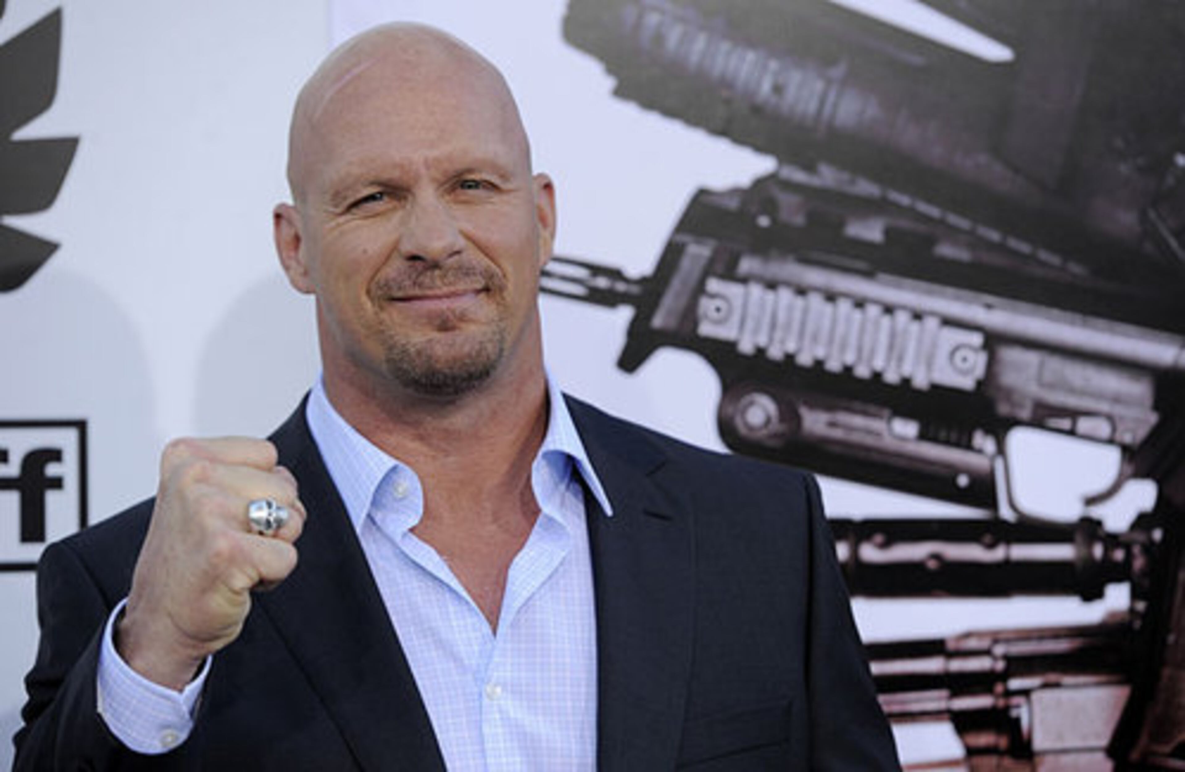 Steve Austin, a cast member in "The Expendables, " poses at the premiere of the film in Los Angeles, Tuesday, Aug. 3, 2010.