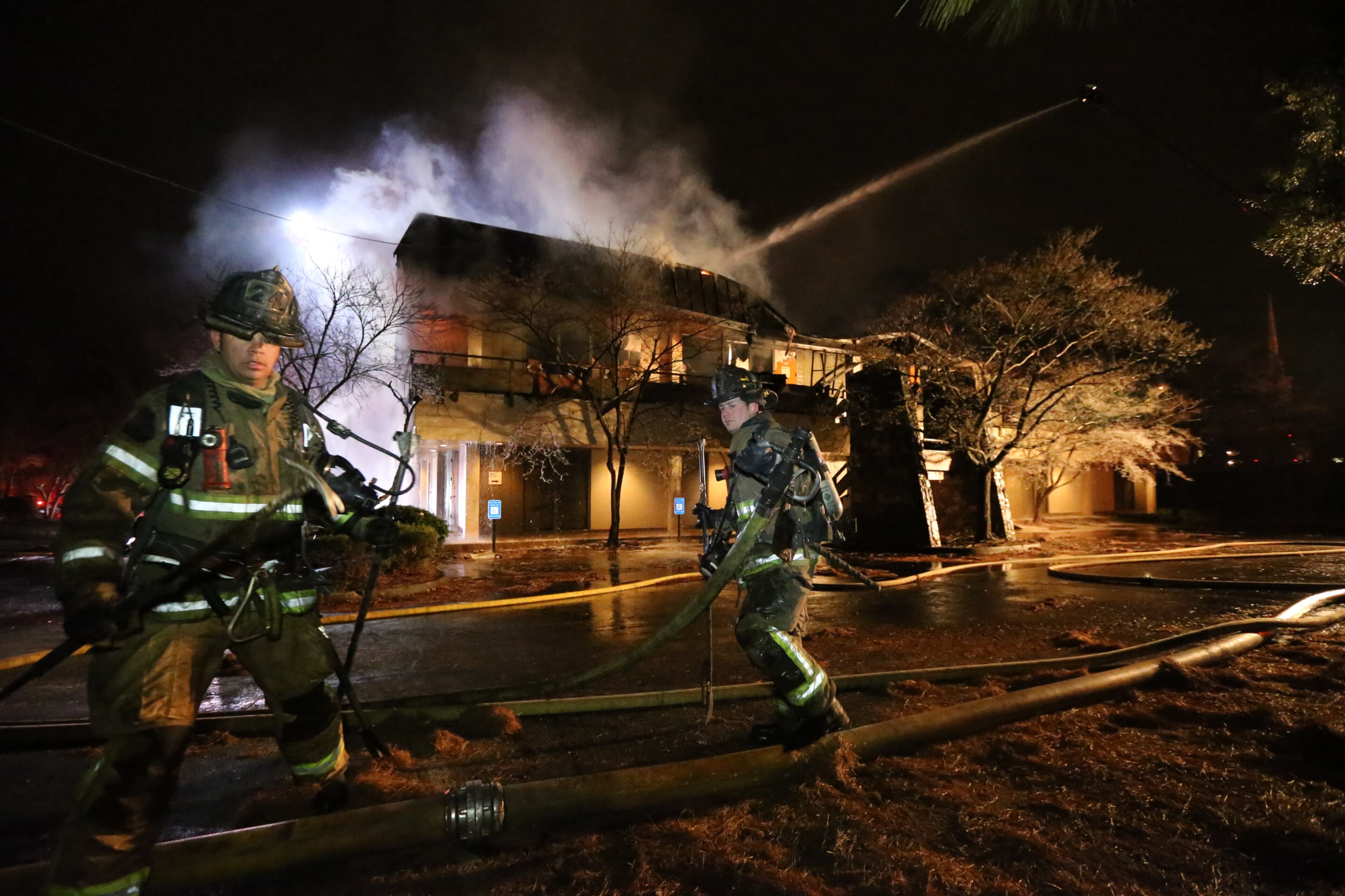 DeKalb County firefighters were battling a huge fire early Tuesday in an office building on Memorial Drive. The blaze broke out before 5 a.m. in a two-story office building in the 4100 block of Memorial Drive, just inside I-285 near Covington Highway. JOHN SPINK/JSPINK@AJC.COM