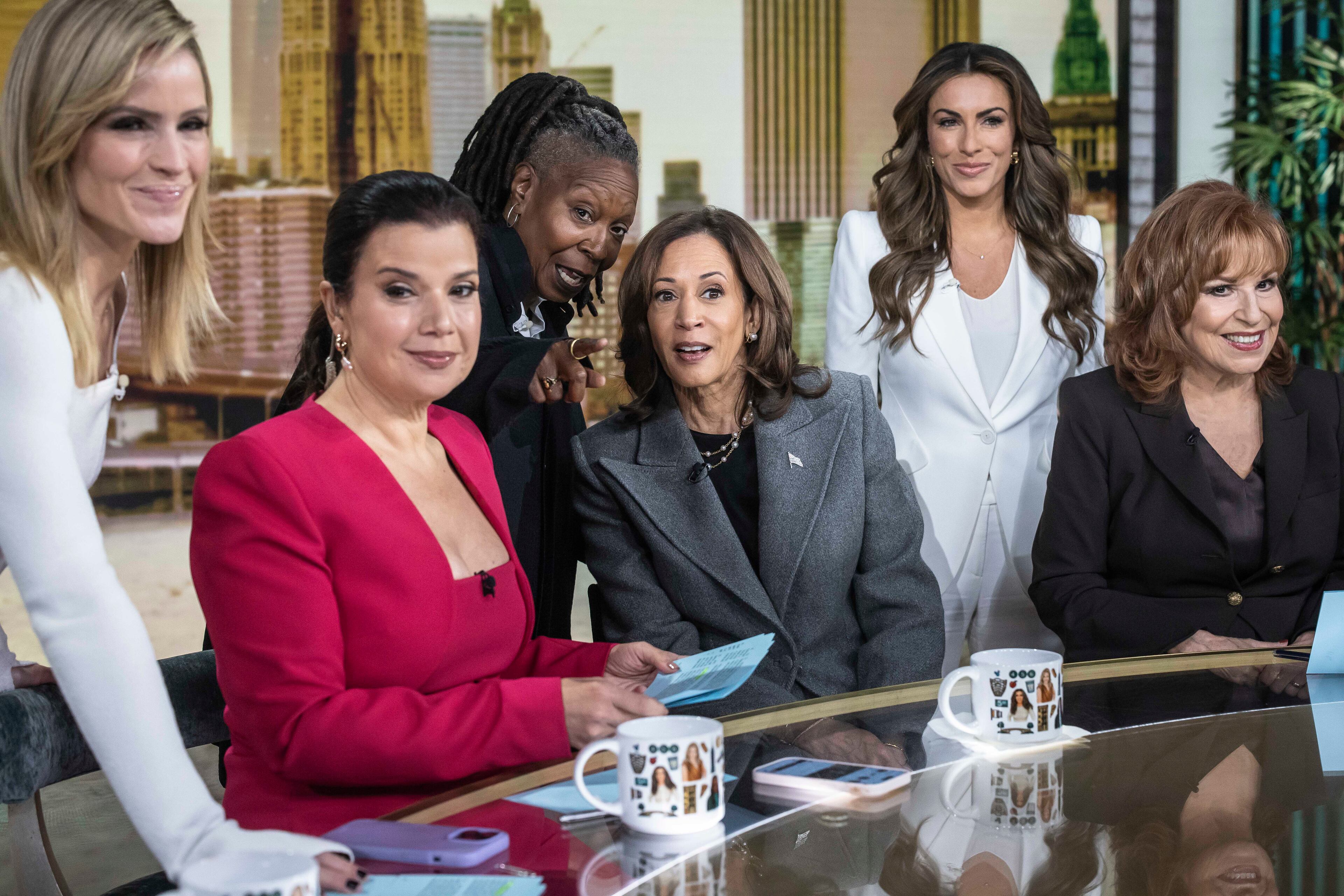 Then-Vice President Kamala Harris, the Democratic presidential nominee, speaks to Whoopi Goldberg during a commercial break on “The View” in 2024. (Dave Sanders/The New York Times)