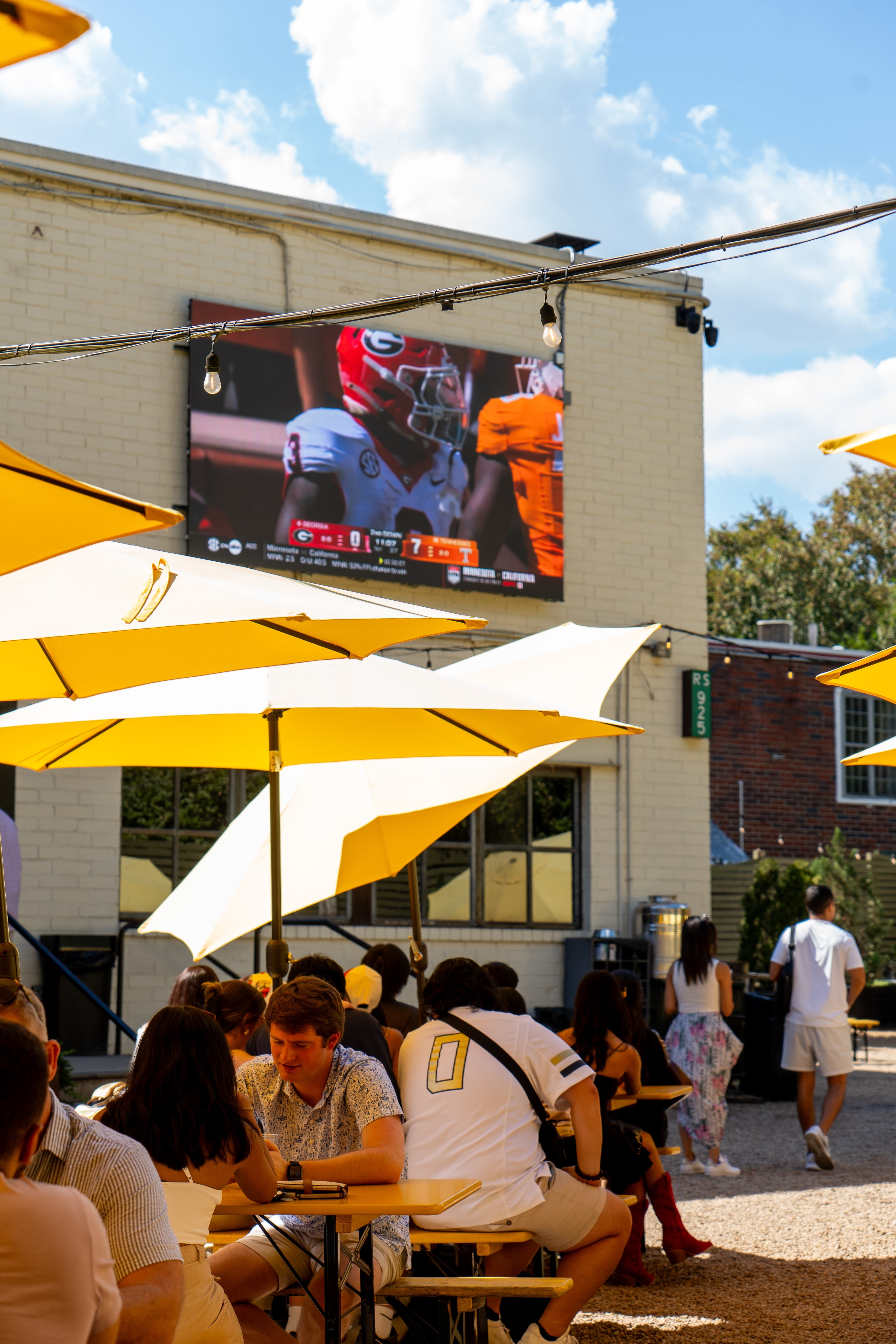 Ladybird Grove & Mess Hall has installed a 14-foot TV screen on the exterior of its building for football season. (Courtesy of Ladybird Grove & Mess Hall)