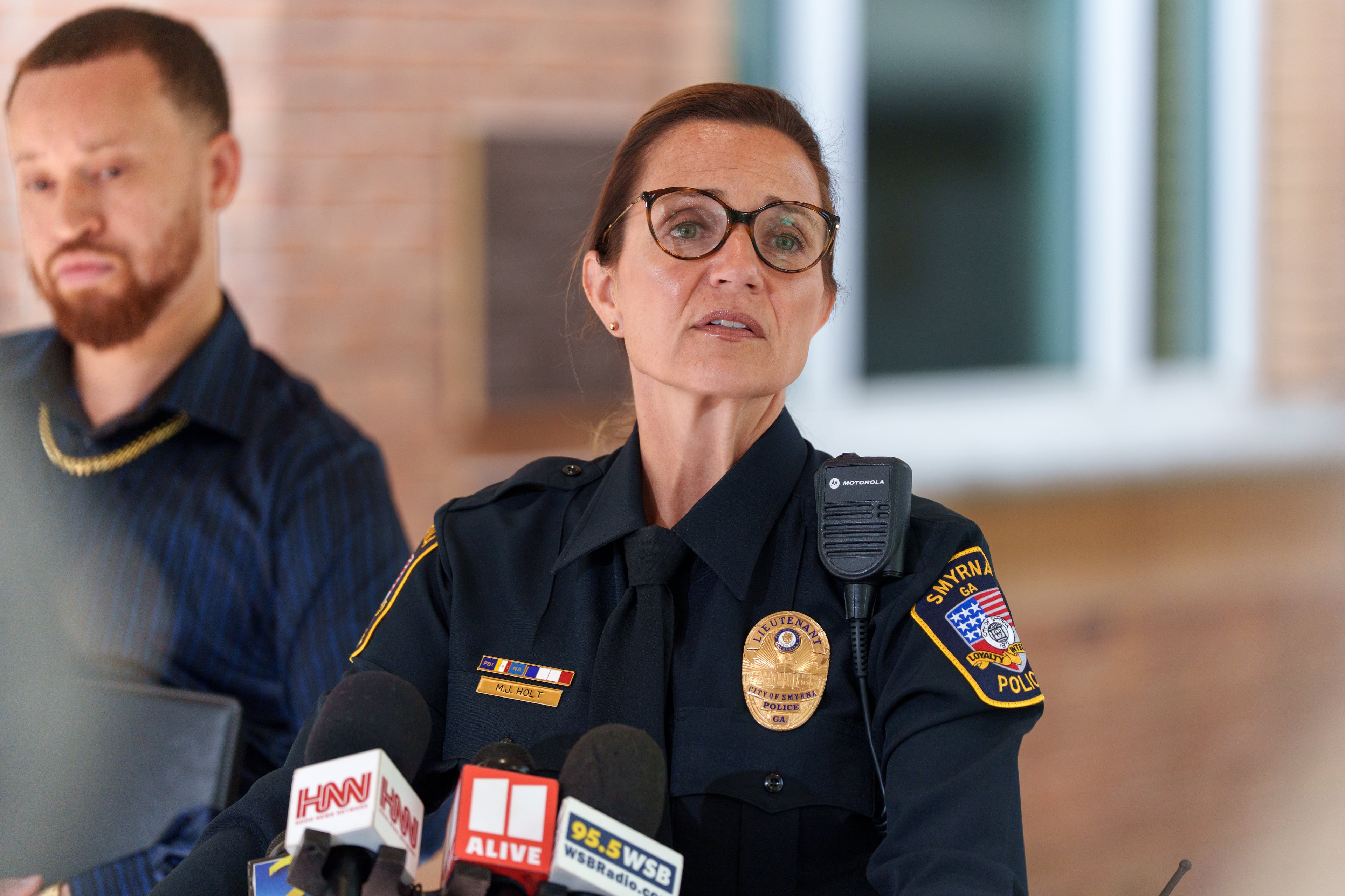 Smyrna police Lt. Meredith Holt speaks at a news conference on Friday, September 25, 2026, regarding their investigation into a recent homicide at the Park Valley Apartments. (Ben Hendren for the AJC)