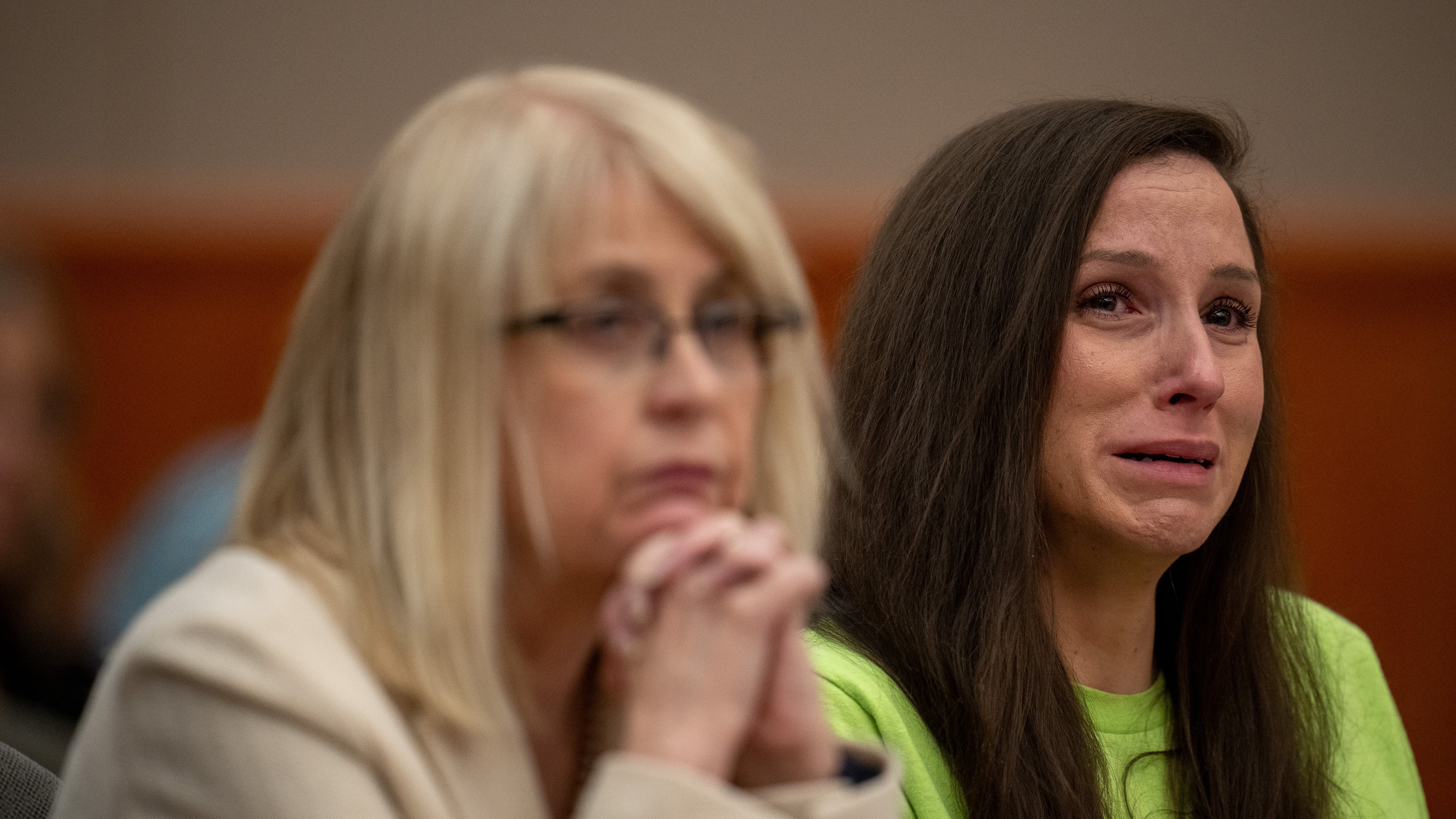 Kouri Richins, right, reacts as her brother, Ronney Darden, speaks on her behalf during her sentencing in 3rd District Court in Park City, Utah, Wednesday, May 13, 2026. (Trent Nelson/The Salt Lake Tribune via AP, Pool)