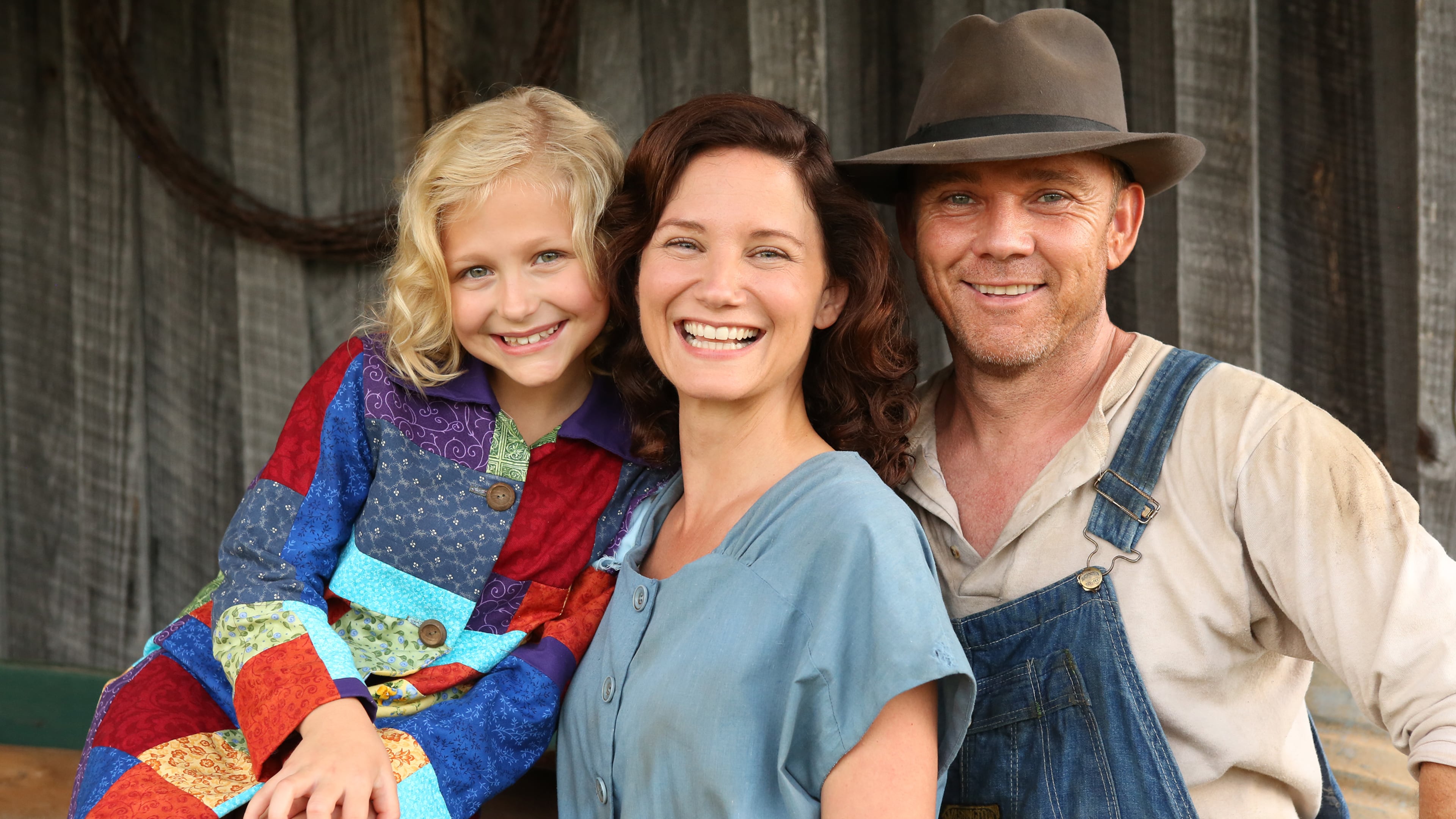 DOLLY PARTON"S COAT OF MANY COLORS -- "Dolly Parton's Coat of Many Colors" -- Pictured: (l-r) Alyvia Alyn Lind as Dolly, Jennifer Nettles as Avie Lee Parton, Rick Schroder as Lee Parton -- (Photo by: Quantrell Colbert/NBC)