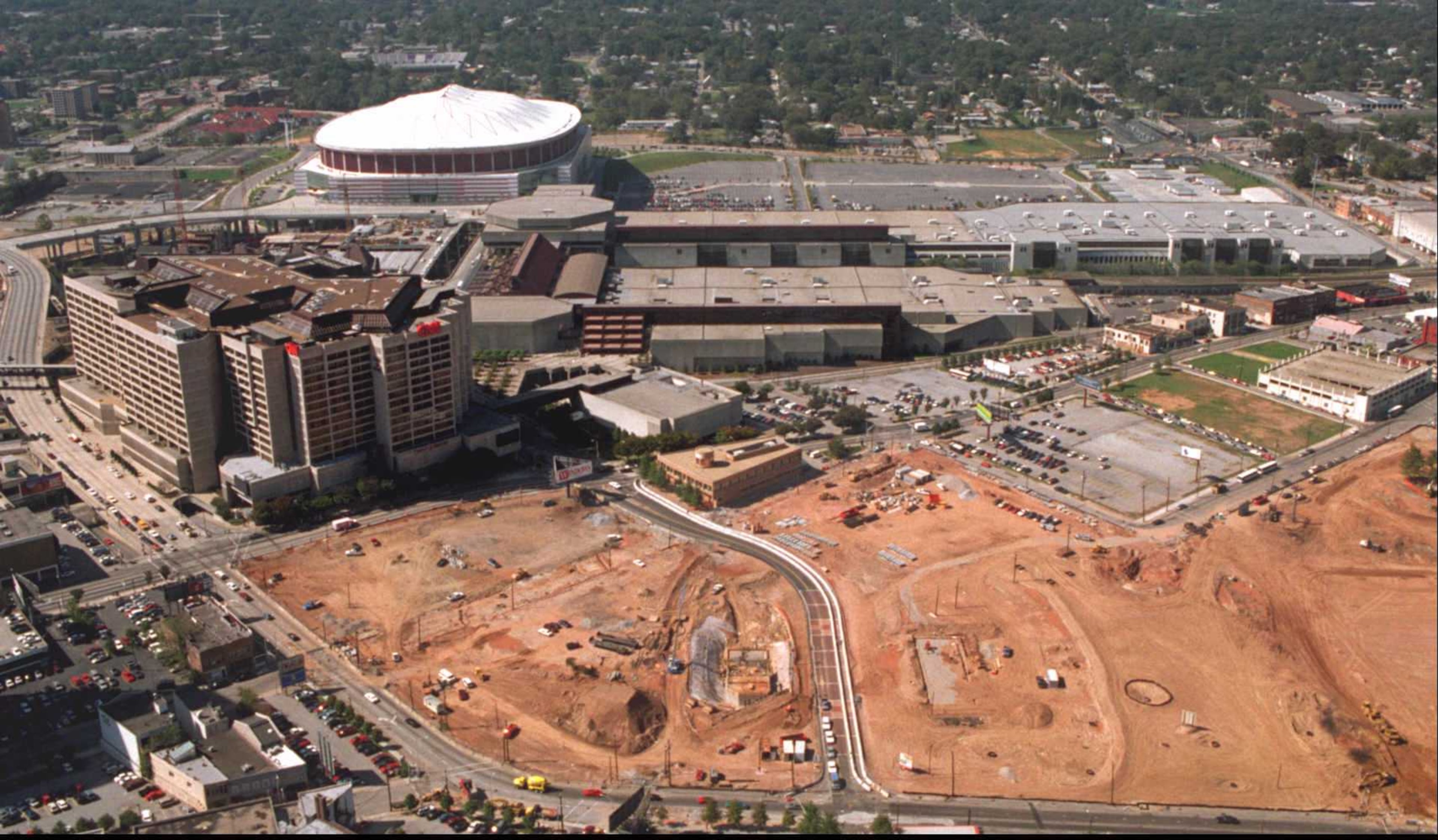Construction on the Centennial Olympic Park as seen from the observation deck on the 73rd floor of the Westin Peachtree Plaza Hotel on October 19, 1995. The Omni, CNN Center, World Congress Center, and the Georgia Dome are in the background. (Kevin Keister /AJC staff)