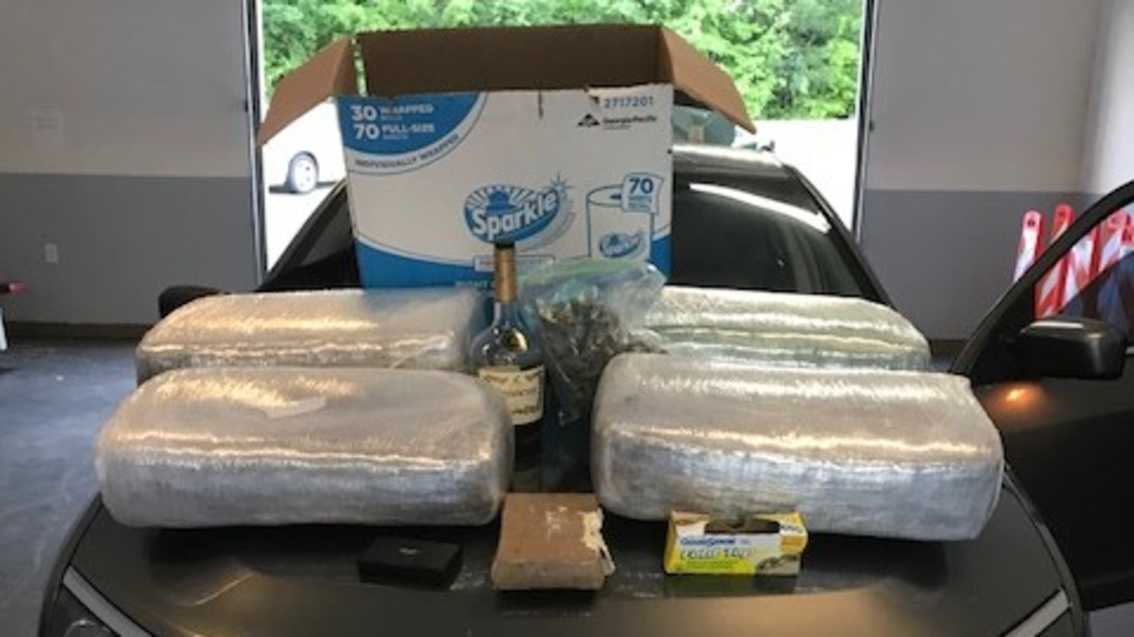 Police found 91.5 pounds of marijuana and two pounds of cocaine in a drug bust.