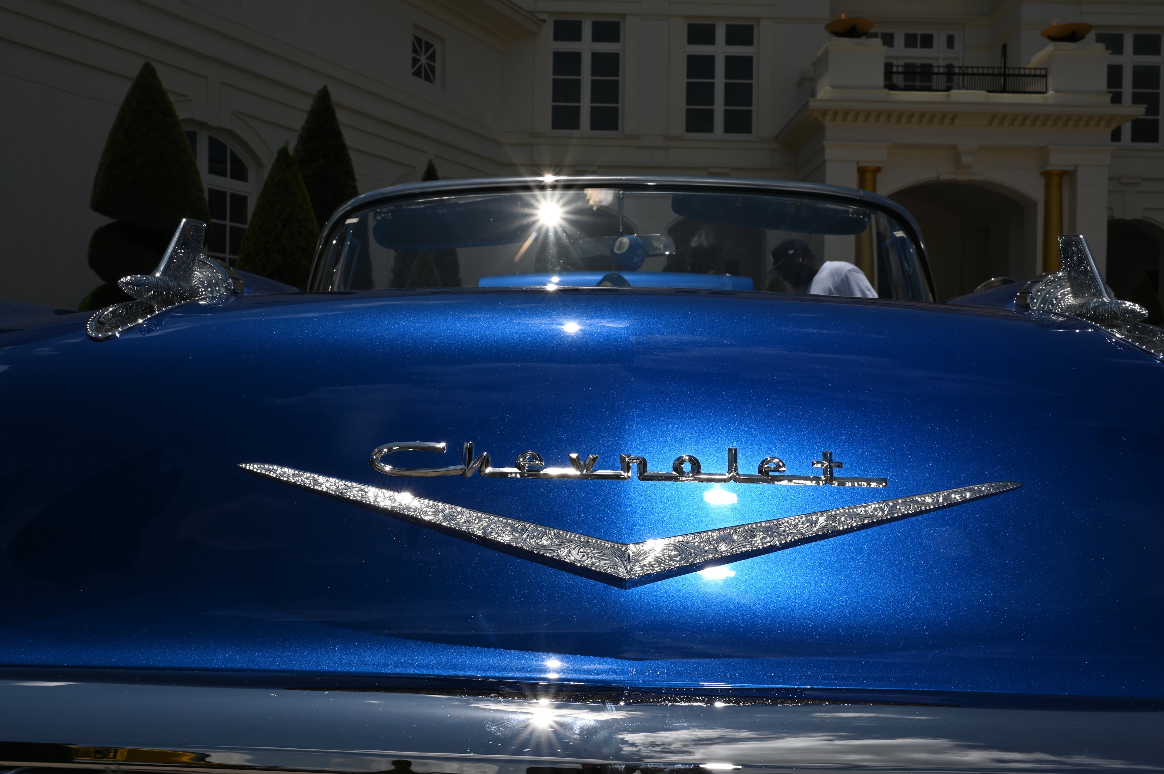 One of fleets of classic/custom automobiles and luxury vehicles is displayed during the 4th Annual Rick Ross Car and Bike Show, Saturday, June 7, 2025, in Fayetteville. The 4th Annual Rick Ross Car and Bike Show will include a vendor market with more than 30 vendors, food trucks, fleets of classic/custom automobiles, luxury vehicles, boats, RVs and trailers on the front of the mansion. Stage performances include Plies, Ross' new signee Nino Breeze and Ross himself. (Hyosub Shin / AJC)