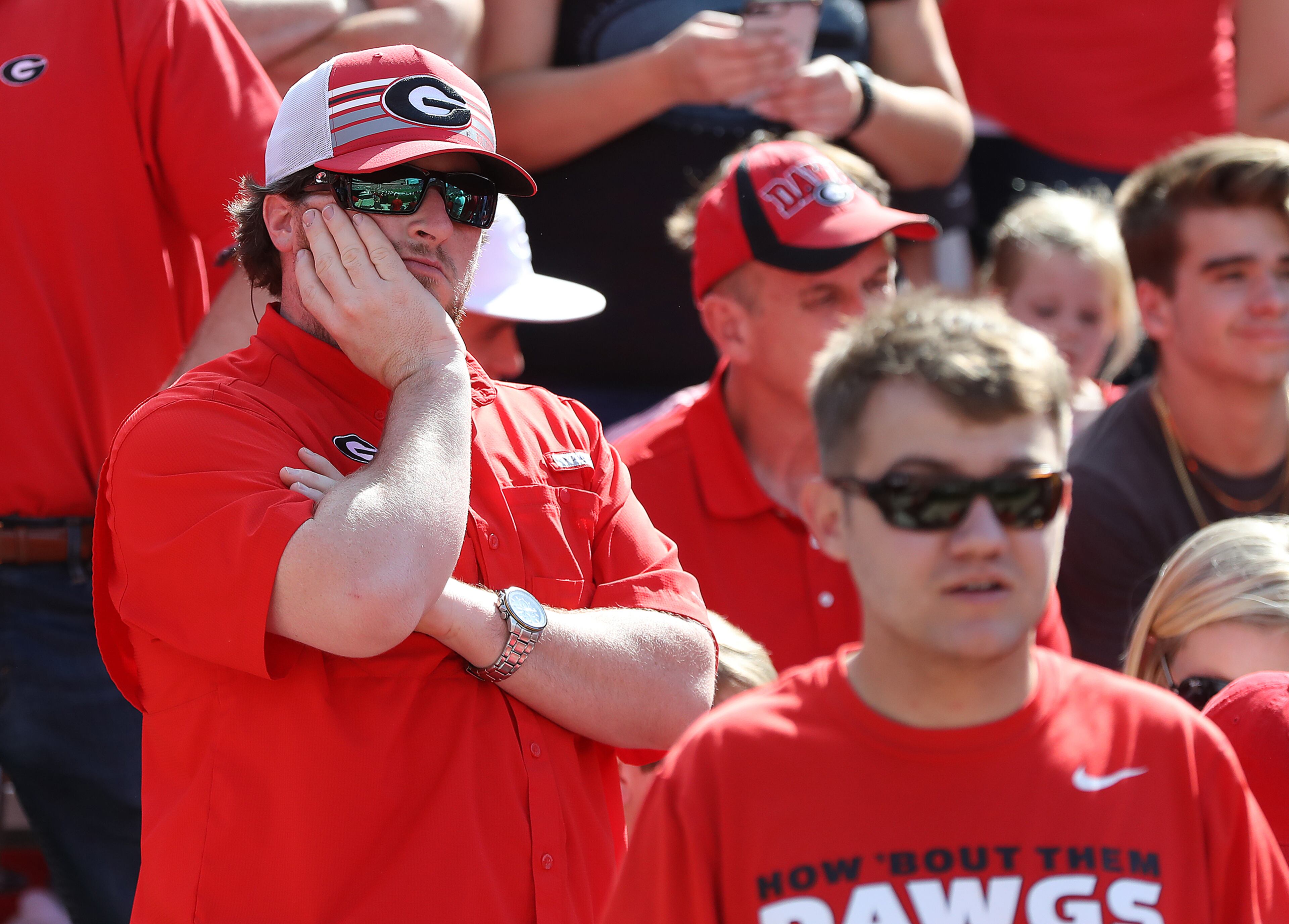Georgia fans react in shock during a 20-17 upset loss to South Carolina in double overtime. Curtis Compton/ccompton@ajc.com