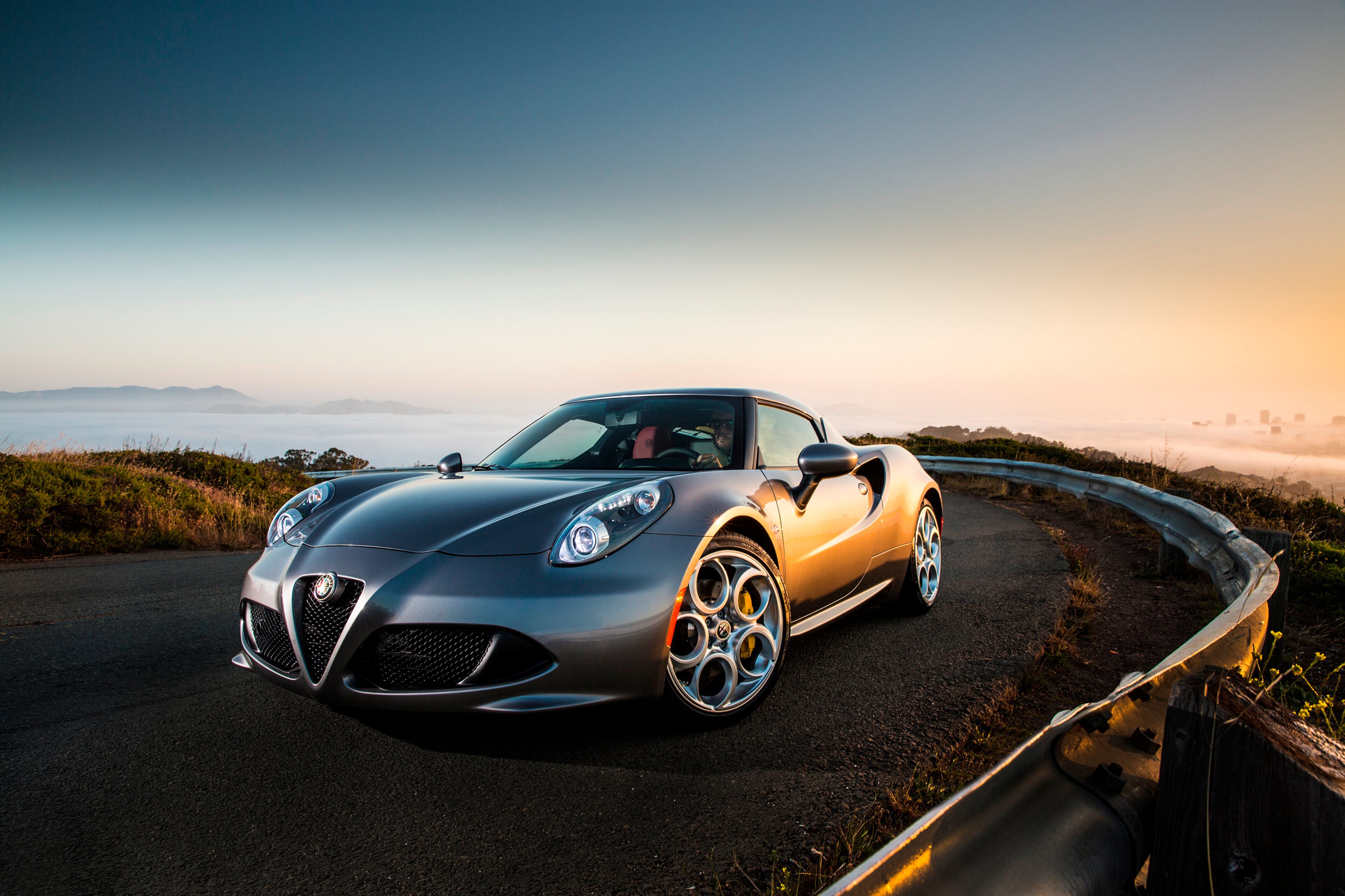 This undated photo provided by Chrysler Group LLC shows the all-new 2015 Alfa Romeo 4C. After a nearly 20-year absence, Italian car maker Alfa Romeo is returning to the U.S. market. Alfa expects to ship 800 of its 4C sports cars to the U.S. this year and 1,200 more in 2015. (AP Photo/Chrysler Group LLC, AJ Mueller)