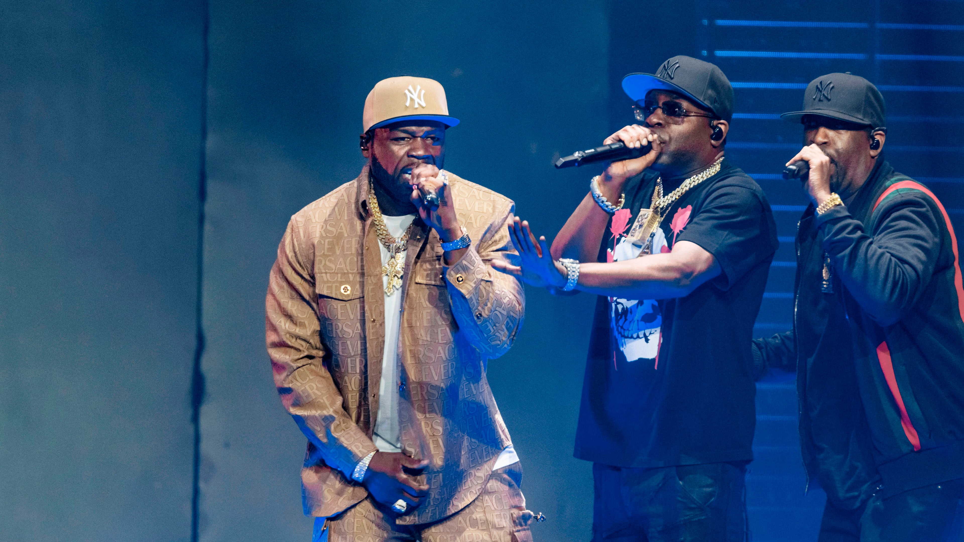 FILE - Rapper Curtis "50 Cent" Jackson, left, performs at the German launch of his "Final Lap Tour" at Hamburg's Barclays Arena in Hamburg, Germany, Friday, Sept. 29, 2023. (Markus Scholz/dpa via AP, File)
