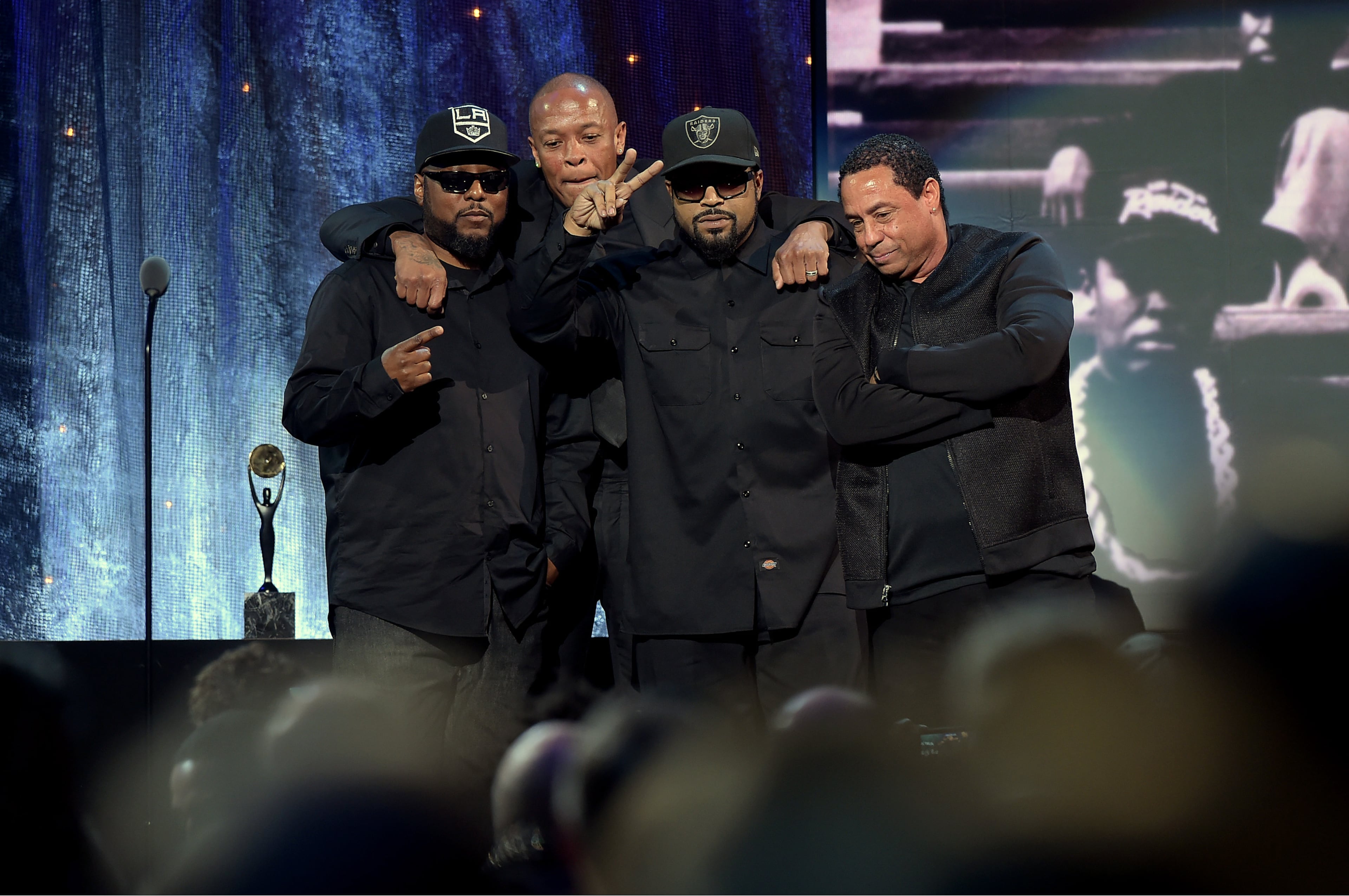 NEW YORK, NEW YORK - APRIL 08: MC Ren, Dr. Dre, Ice Cube and DJ Yella of N.W.A. speak onstage at the 31st Annual Rock And Roll Hall Of Fame Induction Ceremony at Barclays Center on April 8, 2016 in New York City. (Photo by Theo Wargo/Getty Images)