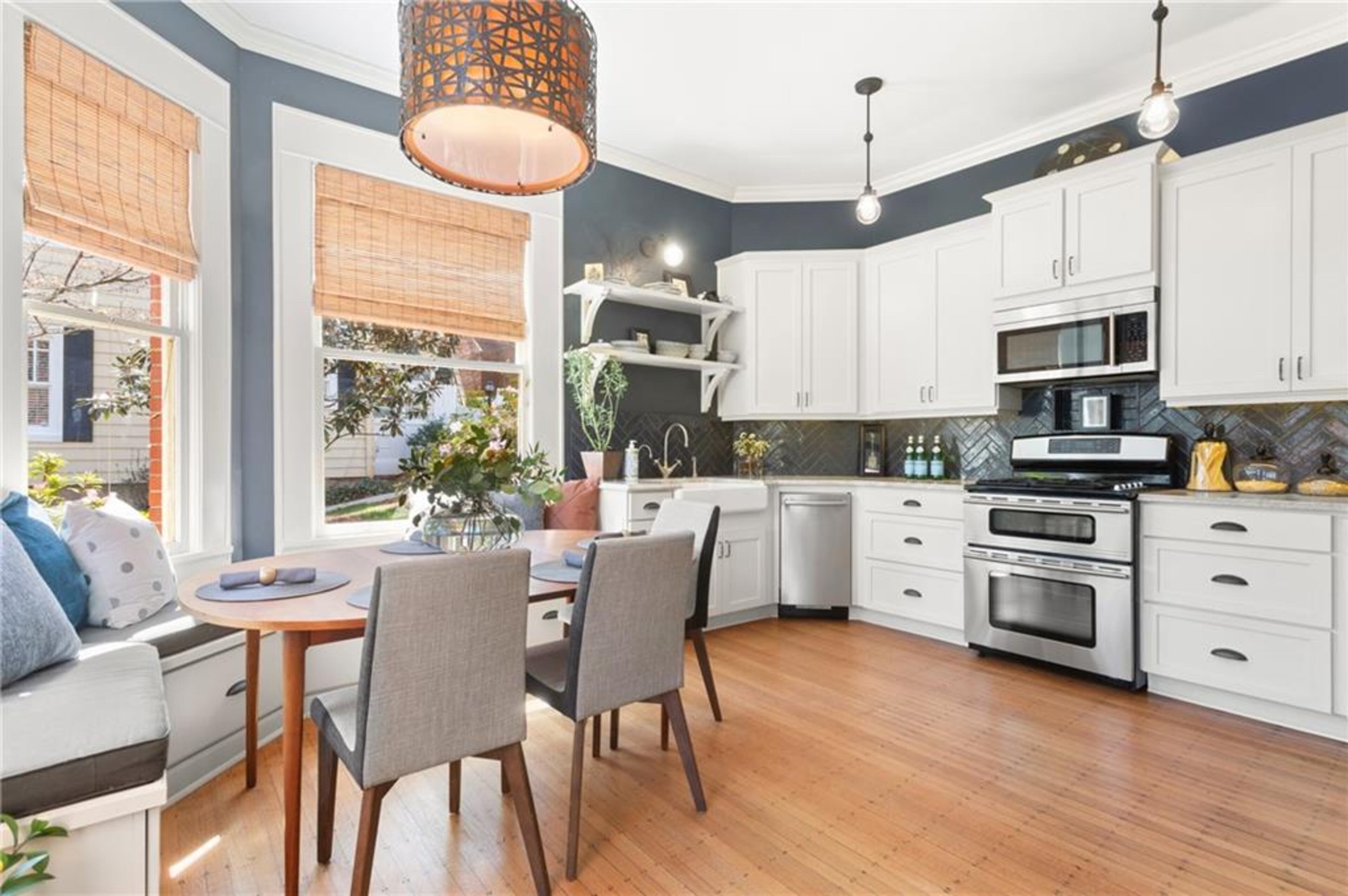 Gorgeous custom light fixtures continue into the kitchen.