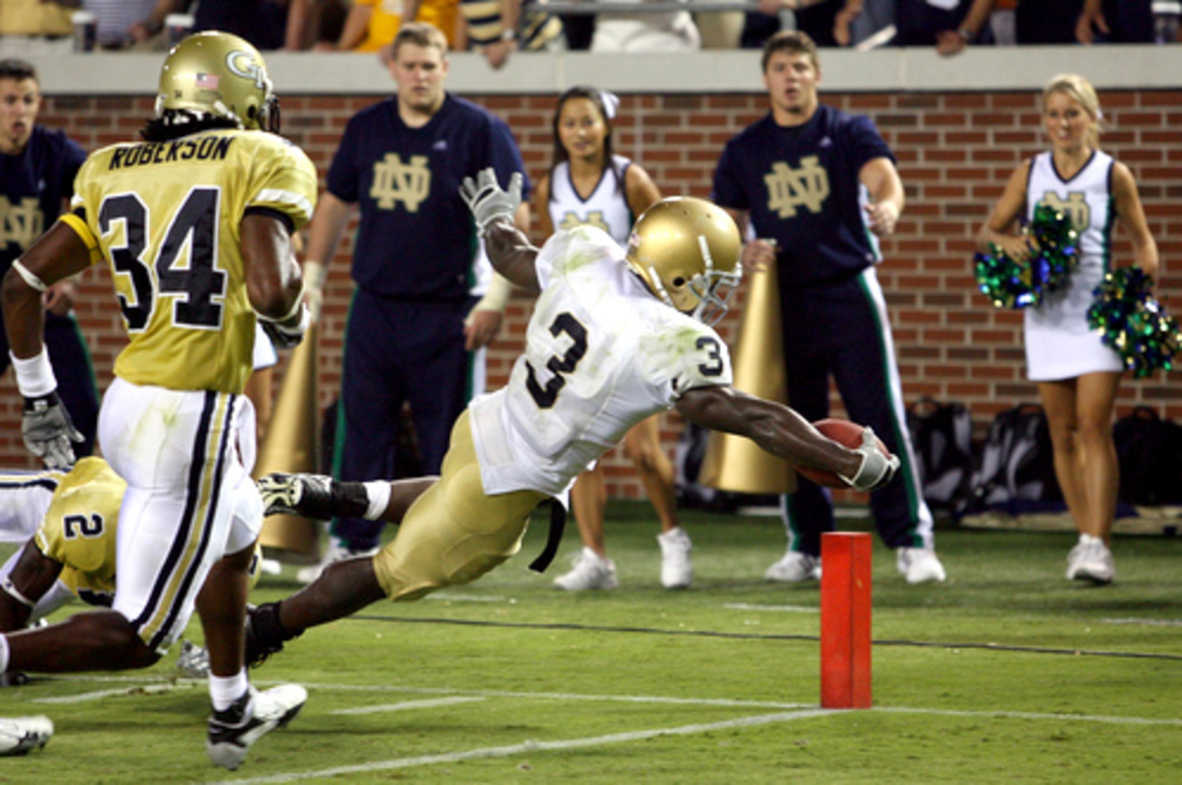 Walker had a happy homecoming of sorts in '06 when he scored a touchdown to help visiting Notre Dame defeat Georgia Tech.
