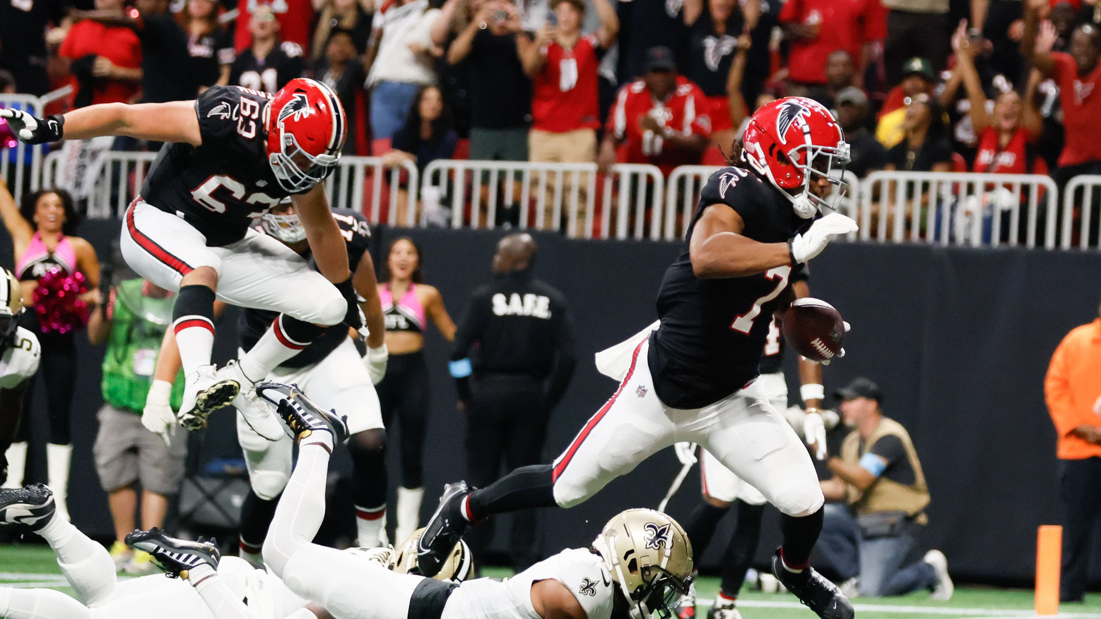 Atlanta Falcons running back Bijan Robinson (7) crosses the end zone, but a flag prevented the score during the second half of an NFL football game against the New Orleans Saints on Sunday, Sept. 29, at Mercedes-Benz Stadium in Atlanta.
(Miguel Martinez/ AJC)