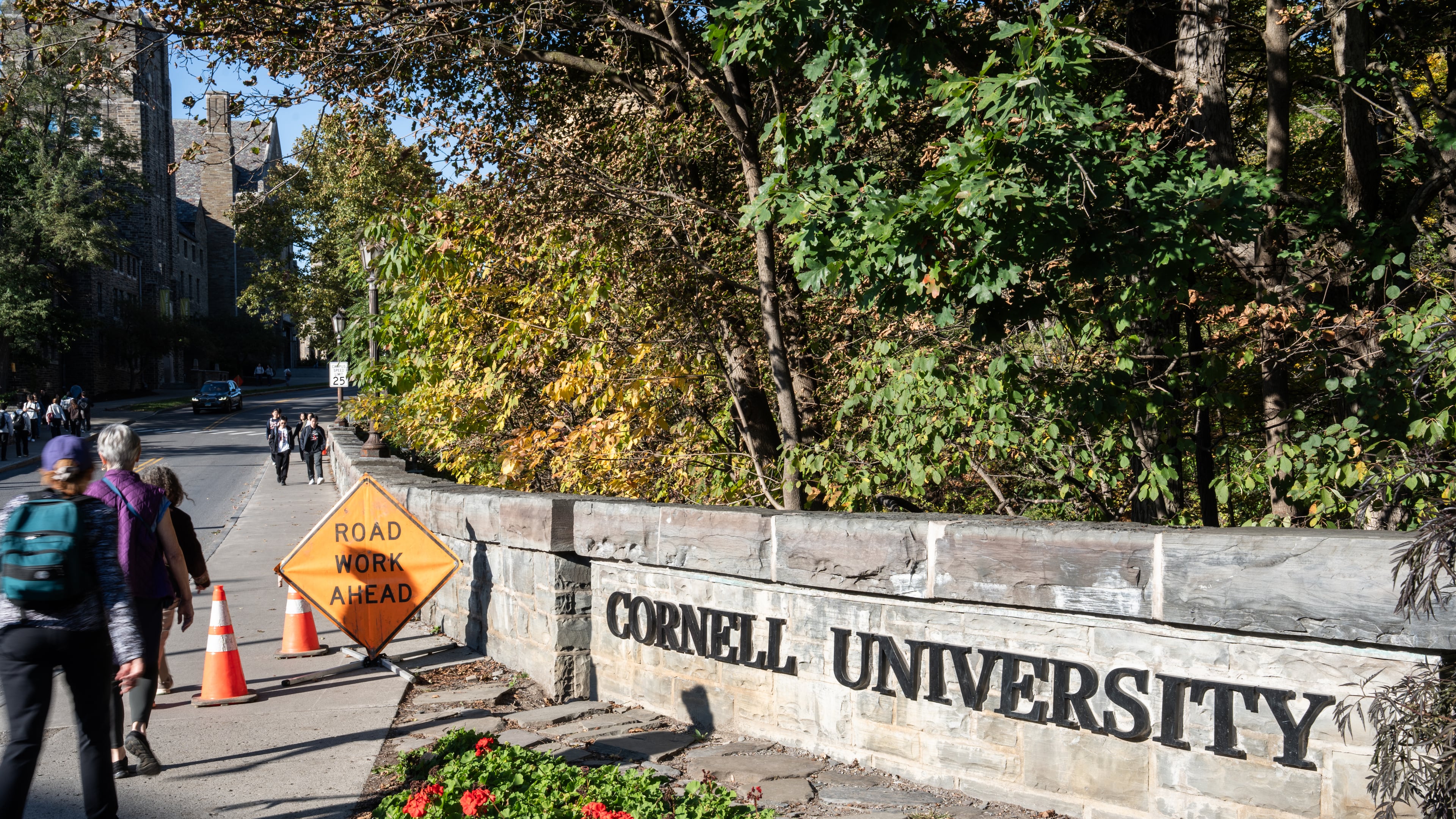 Students walk through Cornell University's campus, Wednesday, Oct. 7, 2026, in Ithaca, N.Y. (AP Photo/Matt Burkhartt)