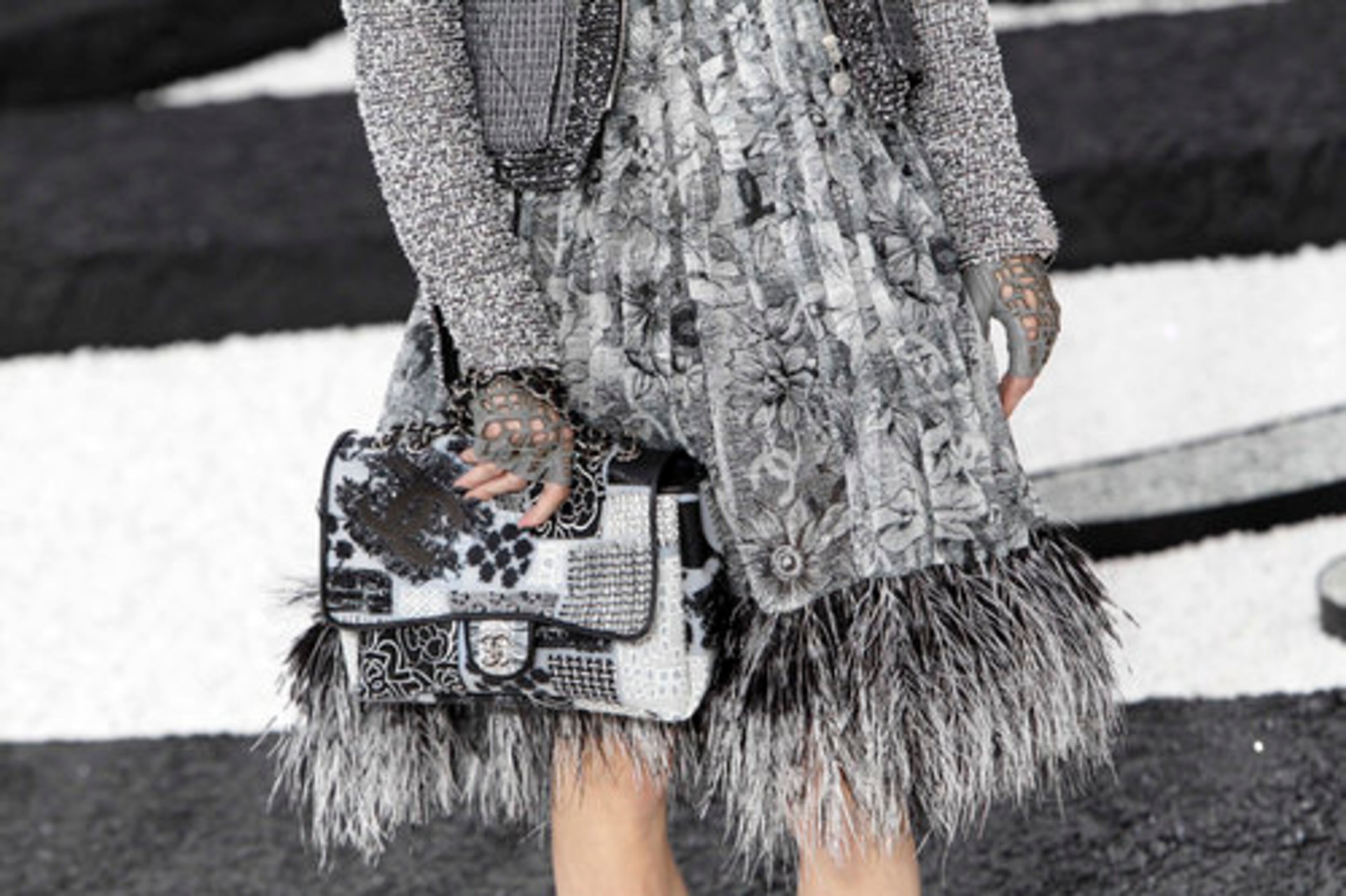 Ostrich feathers that dangled from hemlines gave the collection an airy lightness.