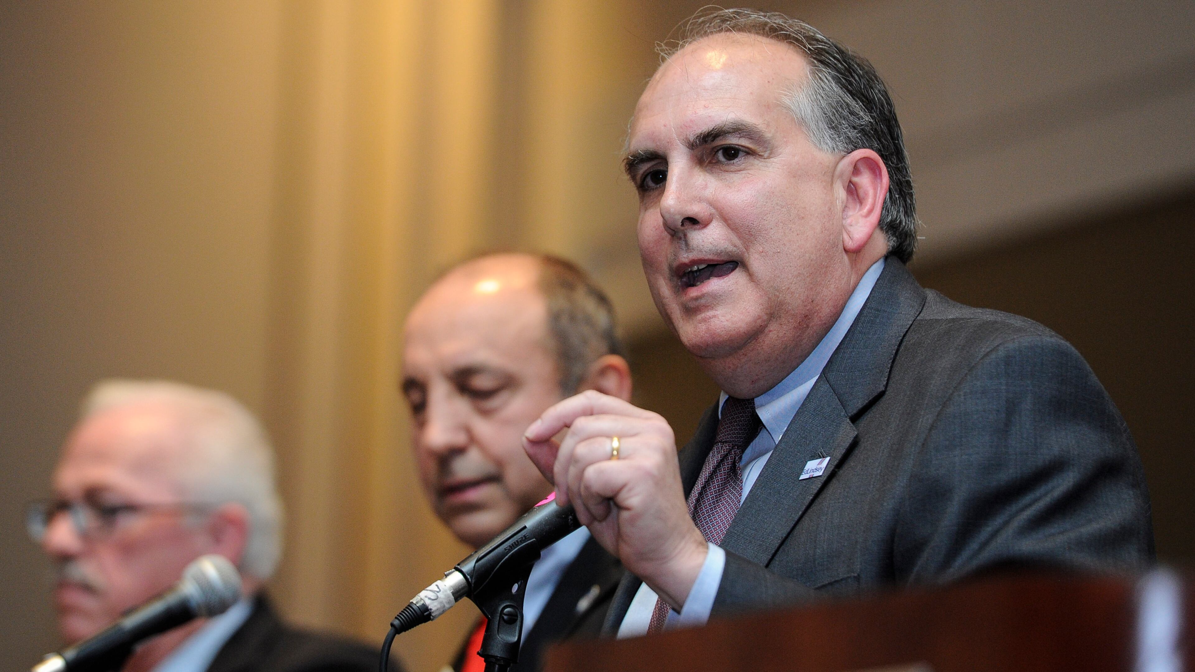 Edward Lindsey, right, speaks during a debate between the Republican Candidates for Georgia's 11th Congressional District including Allan Levene, and Bob Barr, at the Cobb Galeria Centre on Saturday, April 5, 2014. (John Amis for the AJC) Edward Lindsey, right, speaks during his GOP congressional campaign last year. John Amis/AJC