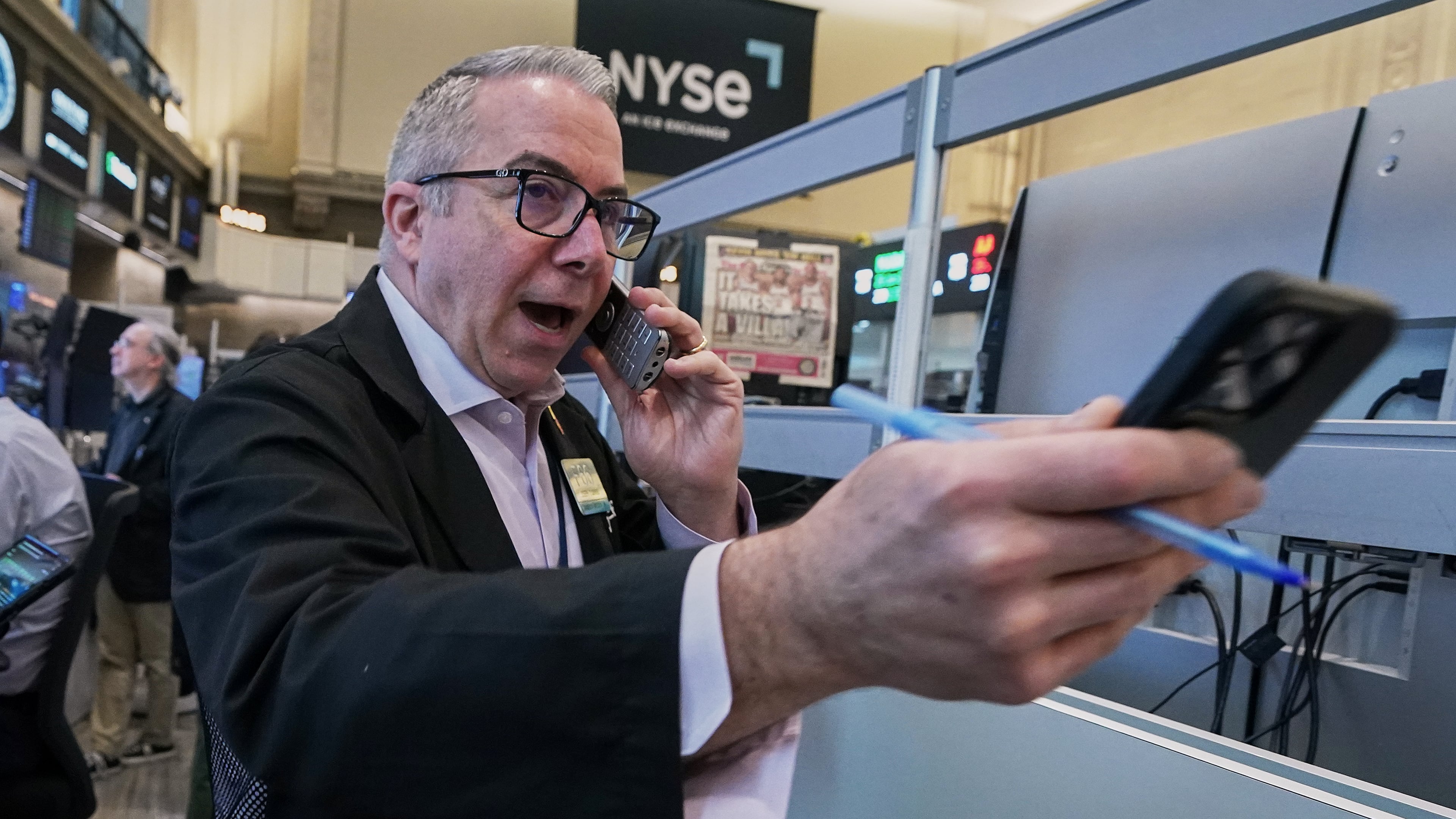 Options trader Joseph D'Arrigo works on the floor of the New York Stock Exchange, Tuesday, June 16, 2026. (AP Photo/Richard Drew)