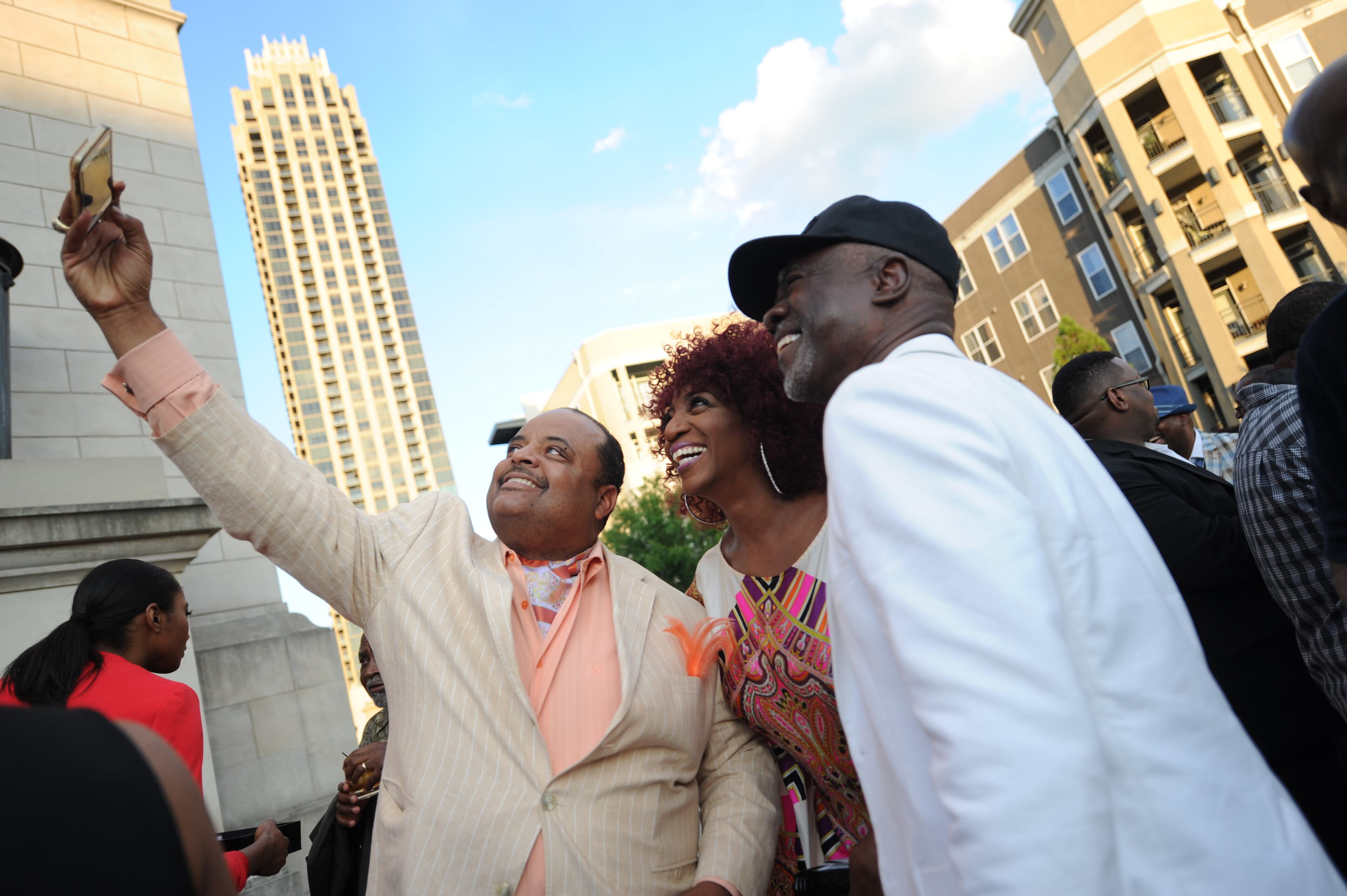 Roland Martin takes a 'selfie' with friends at Saturday’s party benefiting True Colors Theatre Company.