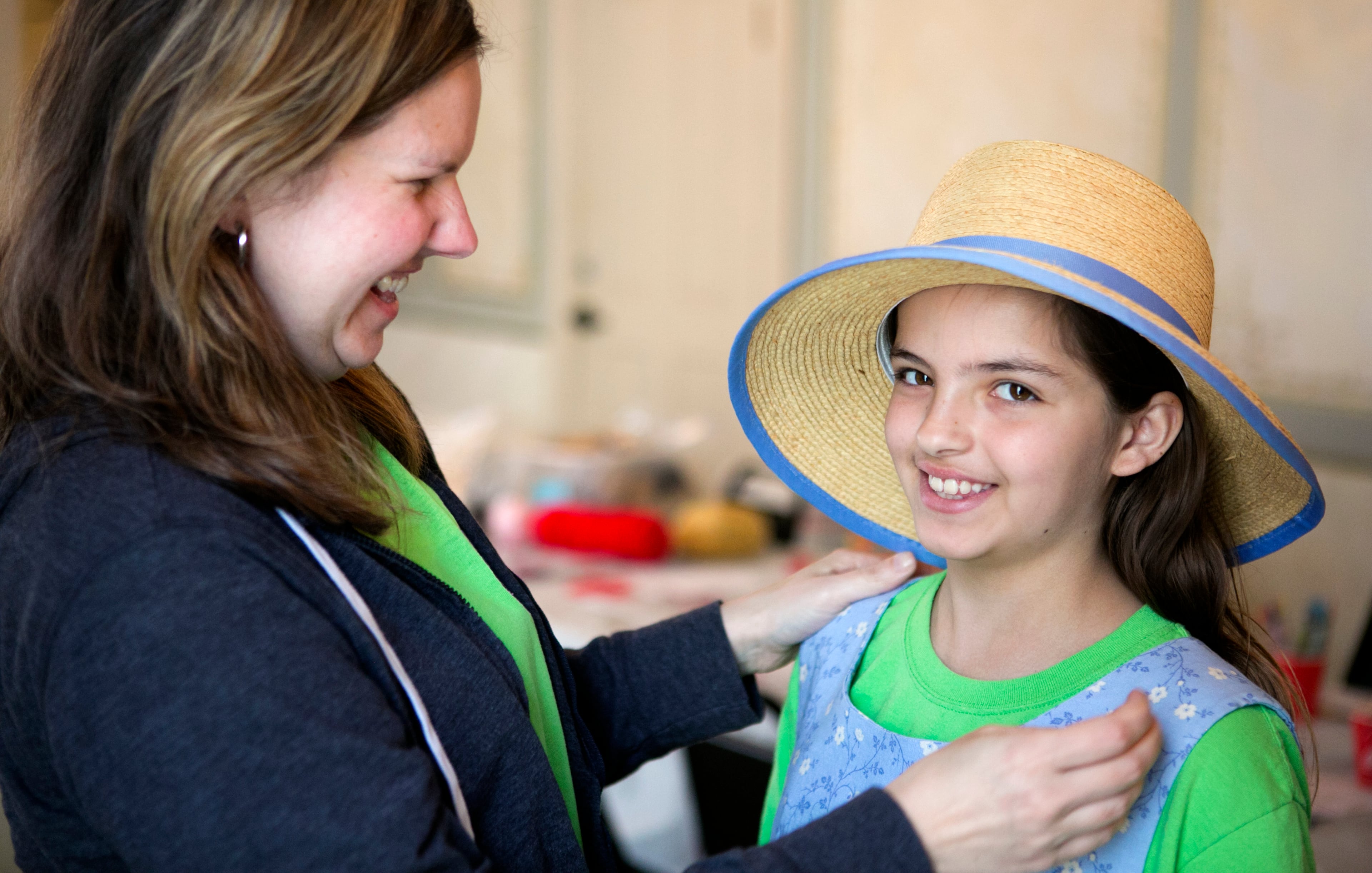 April 2, 2016 - Johns Creek, Ga: Rachel Wrght, 11, of the junior girl scout Troop 4564, of Grayson, wears a period reproduction dress in the Summerour Farmhouse at the Autrey Mill Nature Preserve & Heritage Center Saturday, April 2, 2016, in Johns Creek, Ga. The group of five 5th grade girls were working on their "playing the past" badges. The Summerour House is a Victorian farmhouse built in the 1880's. This is for the insider's guide feature about the Newtown neighborhood. PHOTO / JASON GETZ