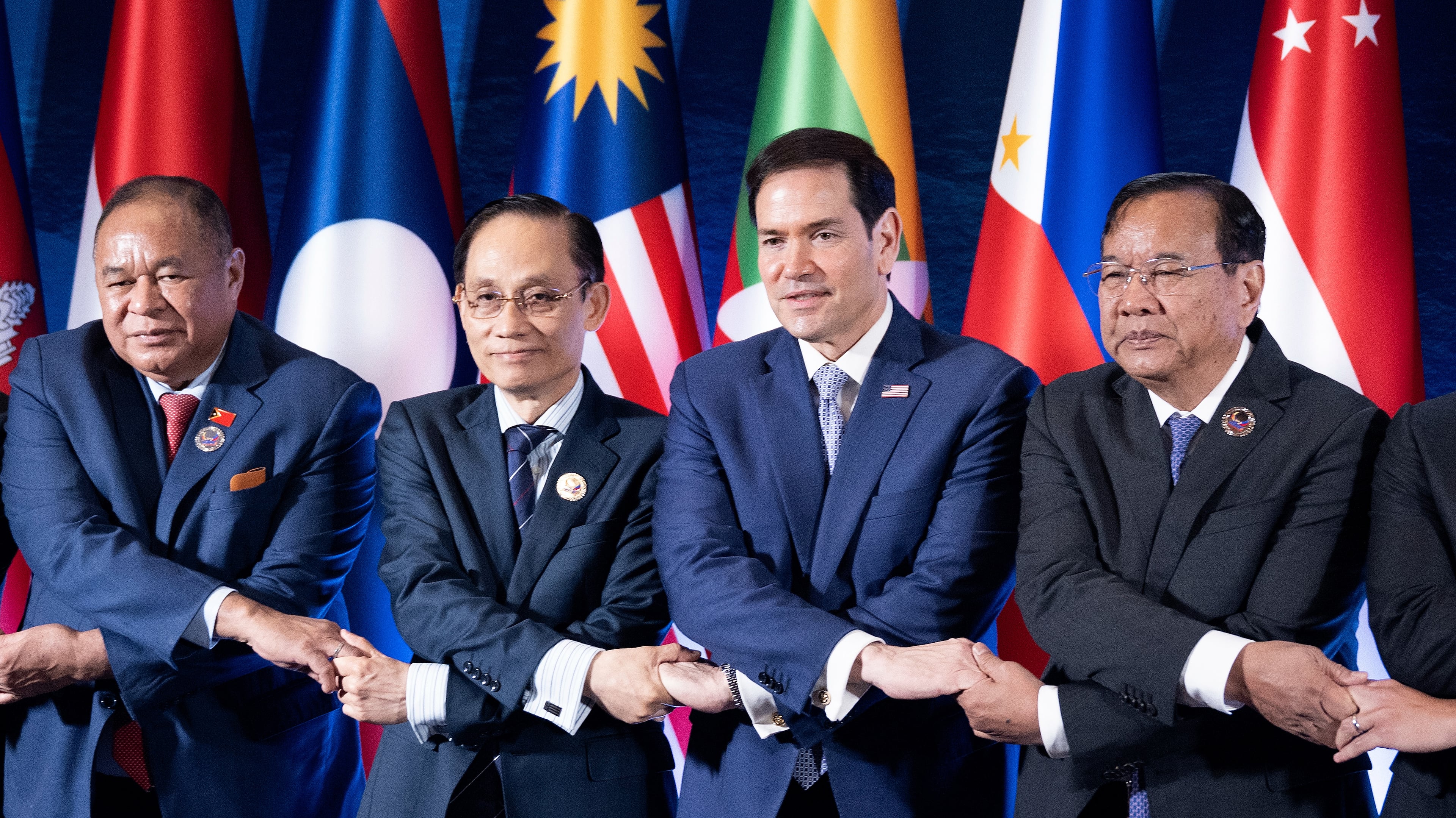 From left, East Timor's Foreign Minister Bendito dos Santos Freitas, Vietnam Foreign Minister Le Hoai Trung, U.S. Secretary of State Marco Rubio and Cambodia's Foreign Minister Prak Sokhonn join hands during the ASEAN Post-Ministerial Conference with the United States on the sidelines of the Association of Southeast Asian Nations (ASEAN) Foreign Ministers' Meeting in Pasay city, Metro Manila, Philippines Wednesday, July 22, 2026. (Brendan Smialowski/Pool Photo via AP)