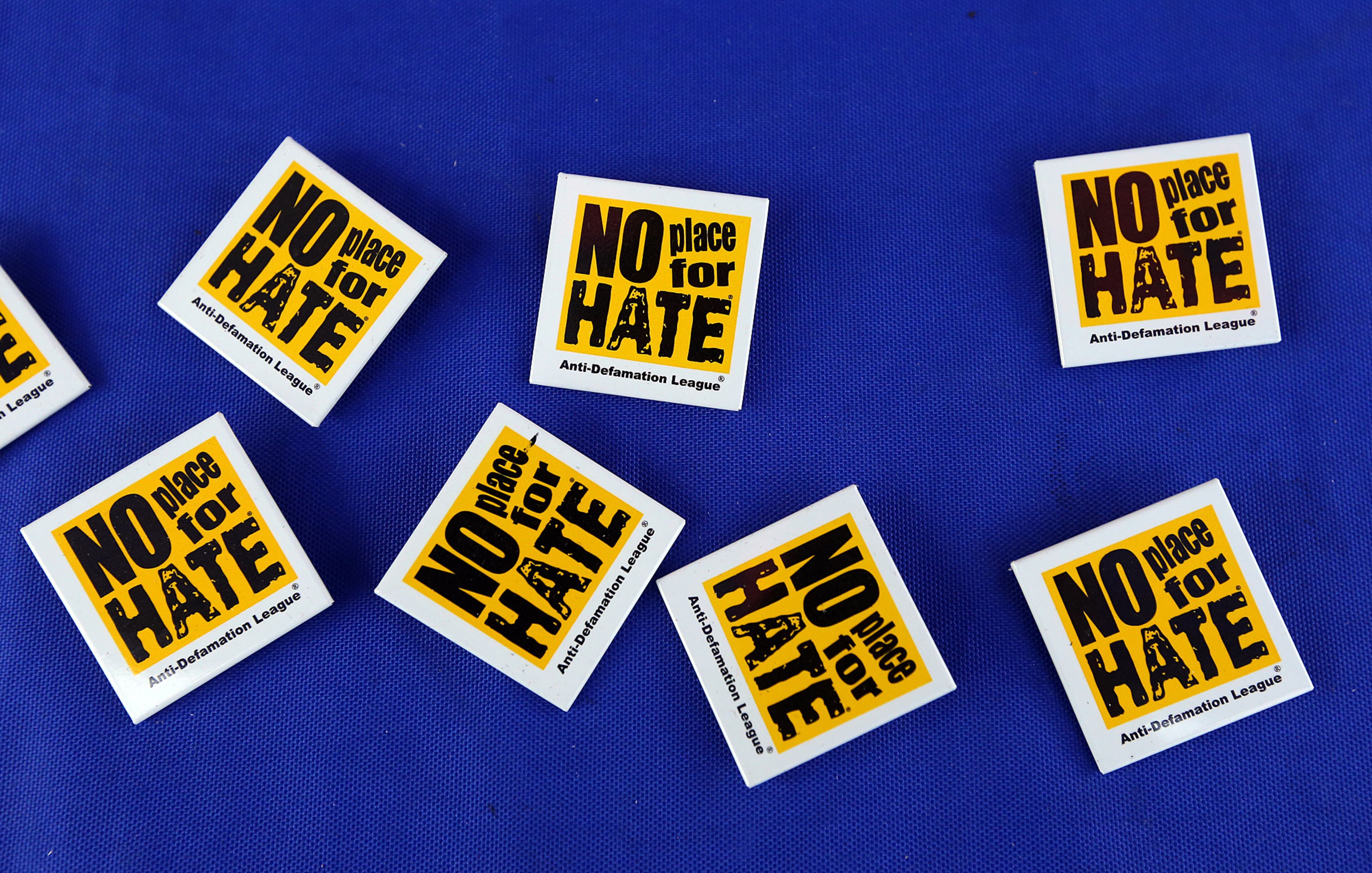 081814 Atlanta: Buttons on a portest table bear a message during a rally for Mike Brown and Ferguson outside the CNN Center on Monday, August 18, 2014, in Atlanta. CURTIS COMPTON / CCOMPTON@AJC.COM