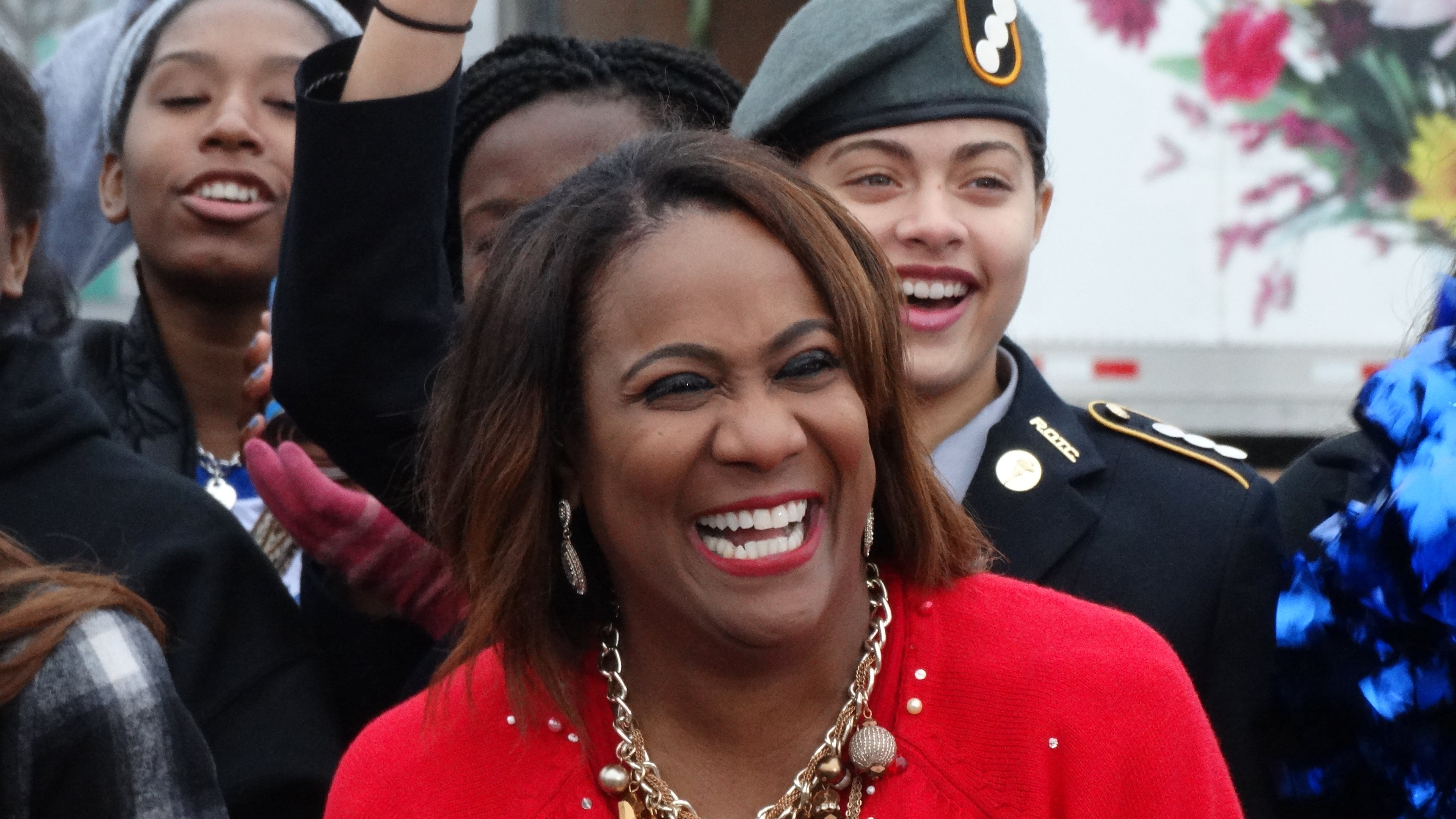 Karyn Greer with her Christmas sweater during the Can-a-Thon for the Salvation Army. CREDIT: Rodney Ho/rho@ajc.com