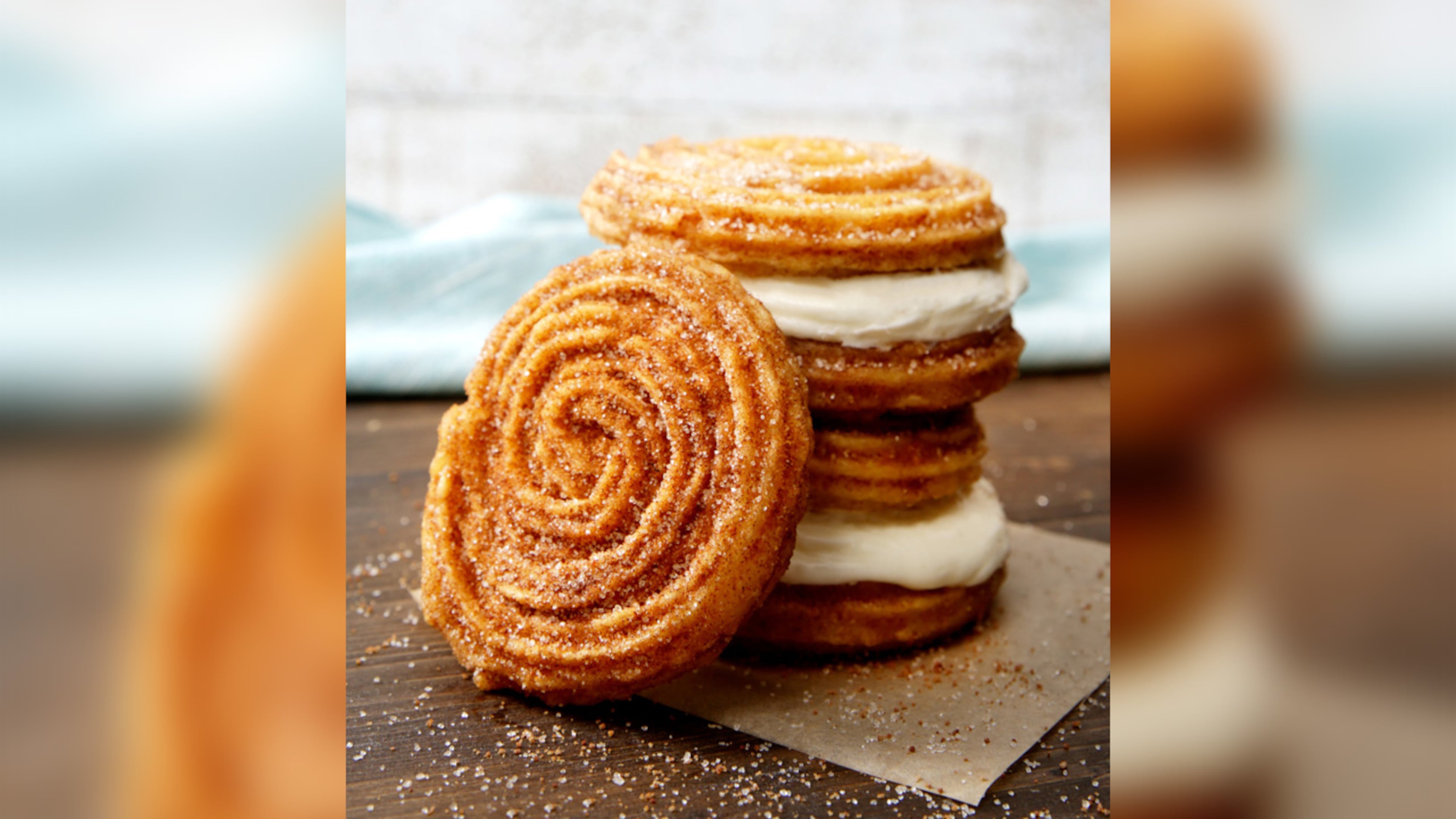 Cinnabon has introduced the Churro Swirl and Churro Frosting Sandwich (pictured) plus a Churro Ice Cream Sandwich with Carvel ice cream. (Photo by Cinnabon)
