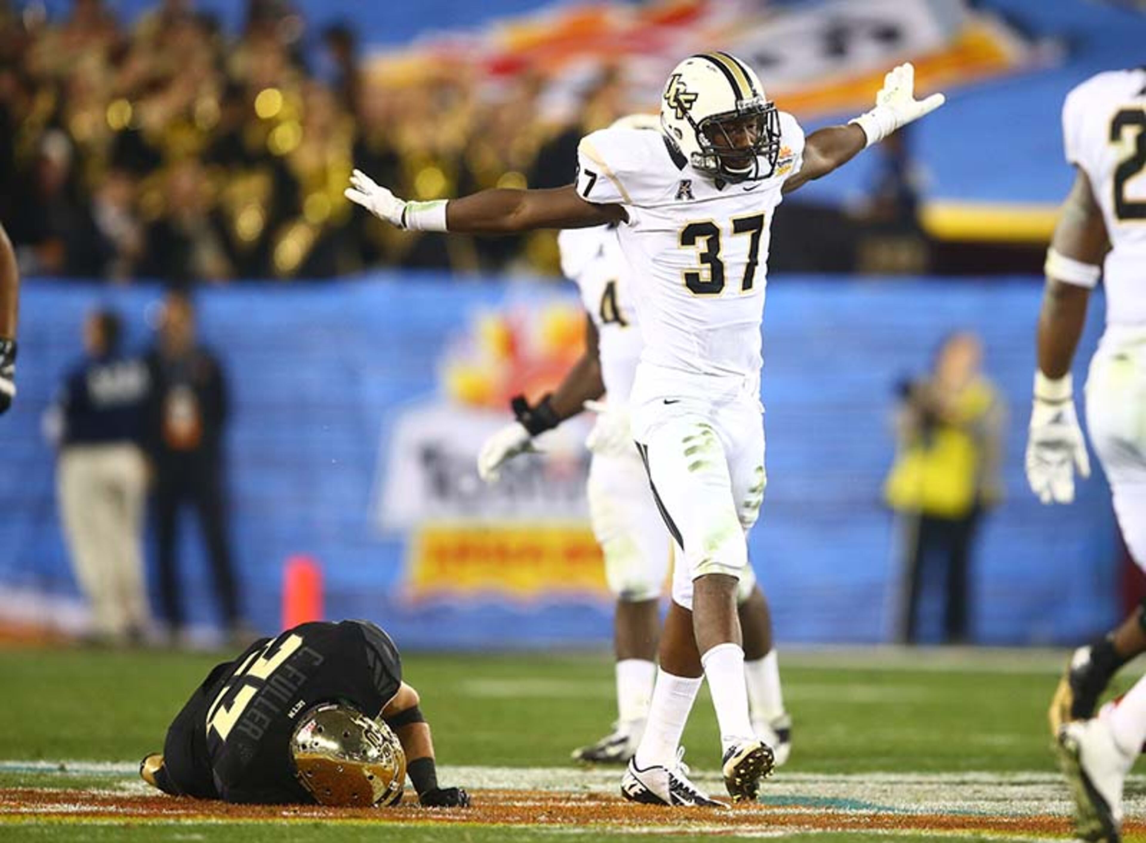 Central Florida Knights pulled off one of the biggest upsets of the bowl season by outlasting the nation's top offensive team in a rousing BCS debut. UCF - a 17-point underdog - turned the highest-scoring Fiesta Bowl into a big-play party by outlasting the sixth-ranked Bears 52-42 on New Years Day in Glendale, Calif.