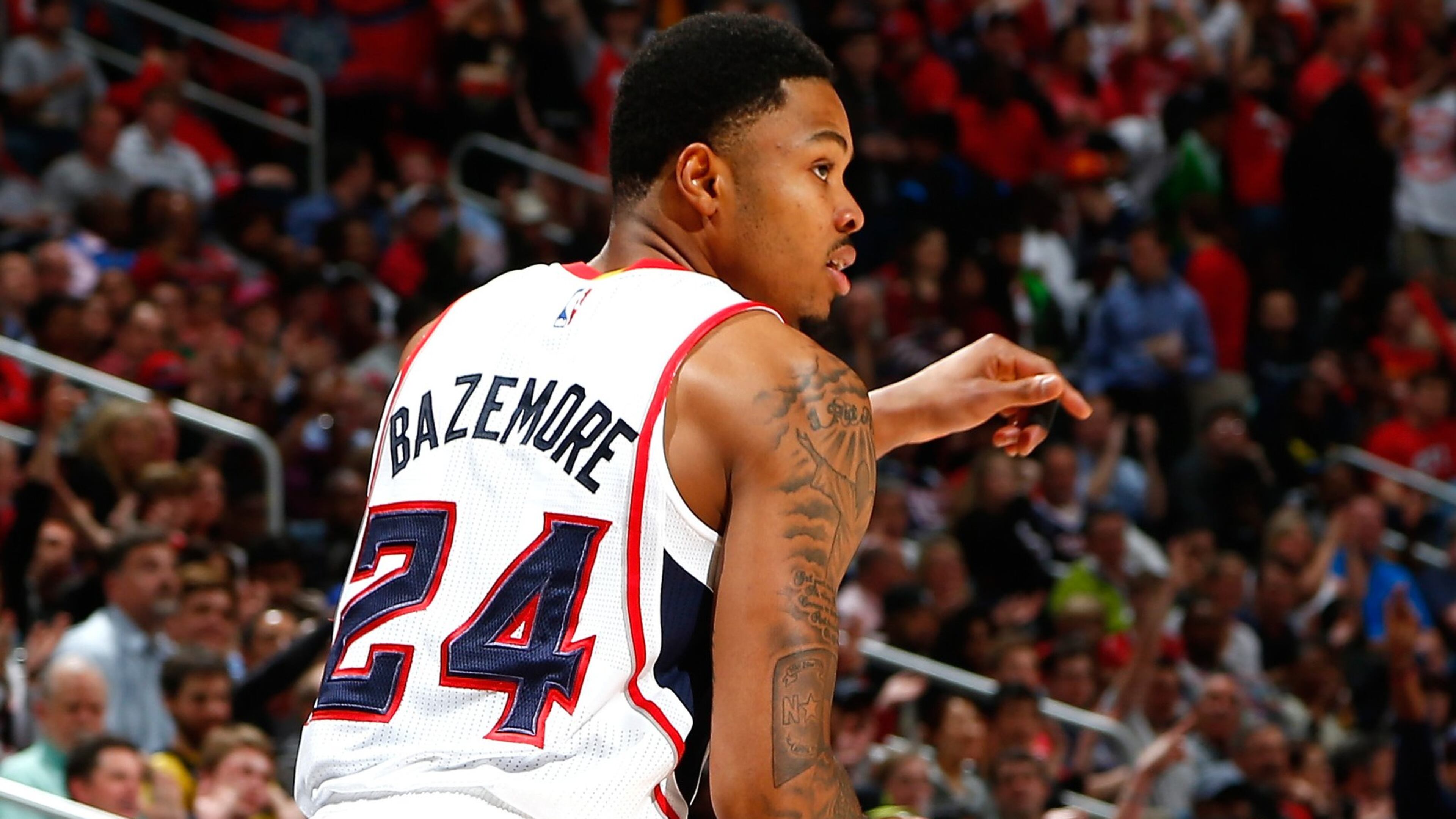Hawks’ Kent Bazemore reacts after a 3-pointer earlier this season. (Photo by Kevin C. Cox/Getty Images)
